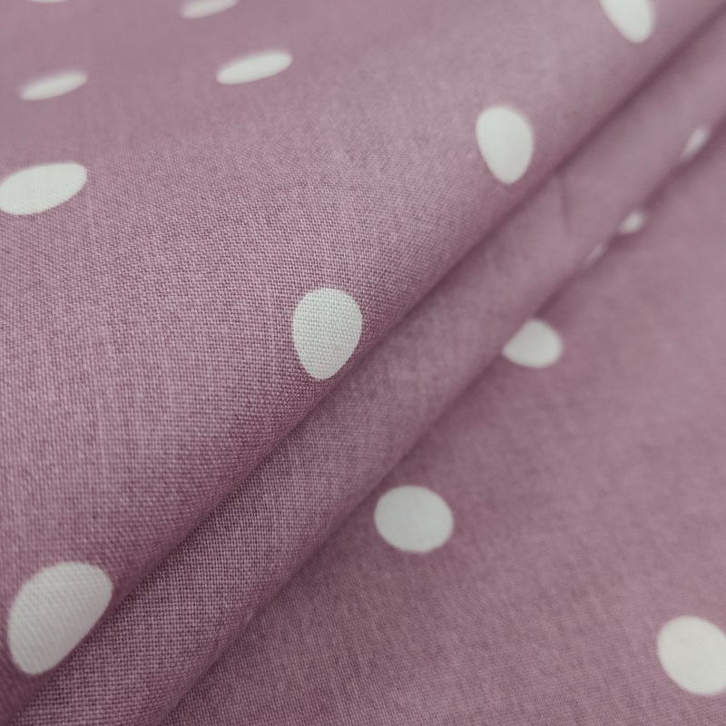 Tessuto di cotone lilla pois bianchi