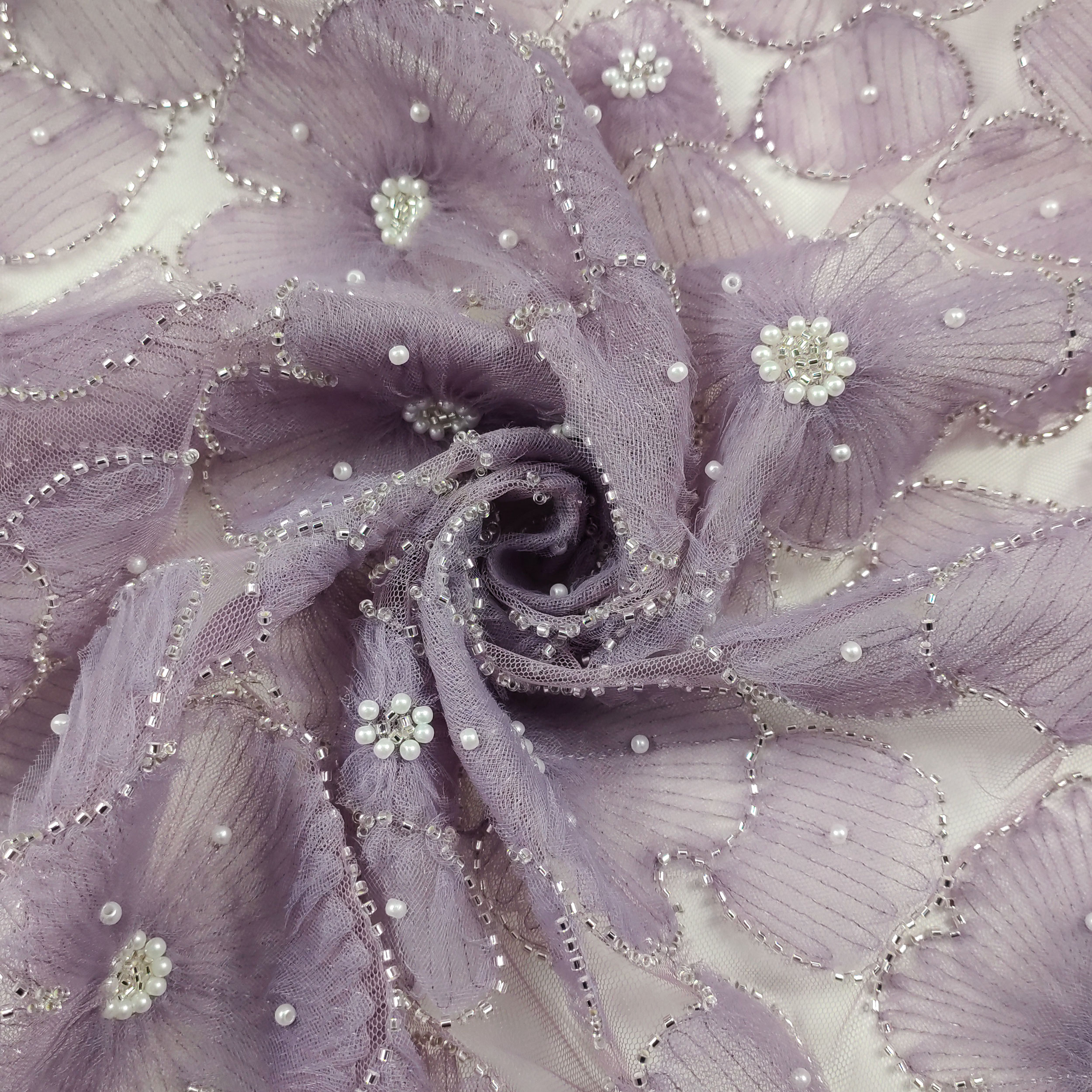 tessuto online per abbigliamento tulle con perline lilla