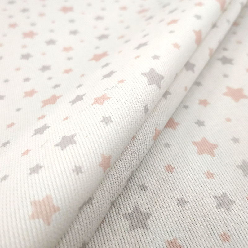 Tessuto piquet stelle rosa