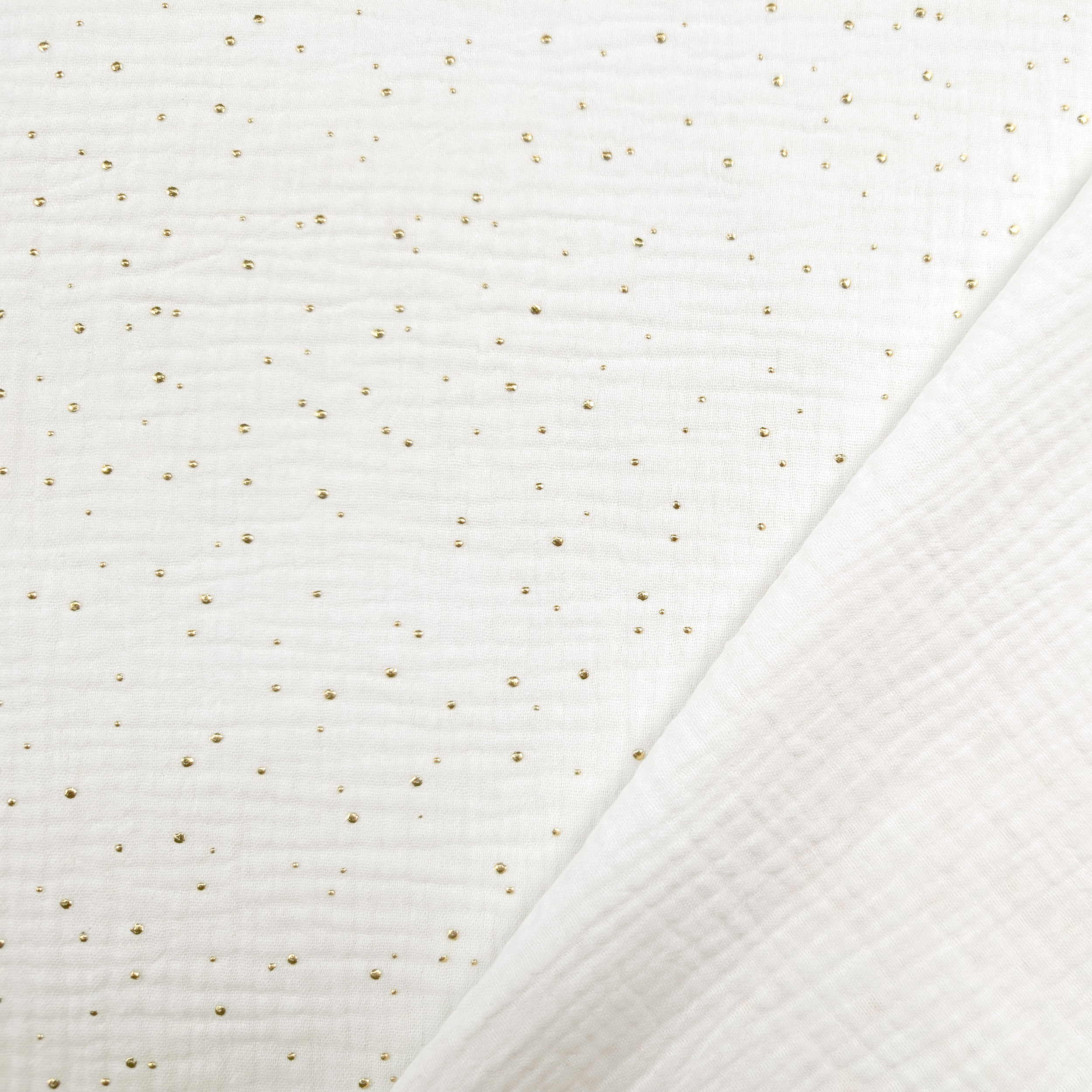 Mussola Cotone Bianco Latte con Pois Oro Image