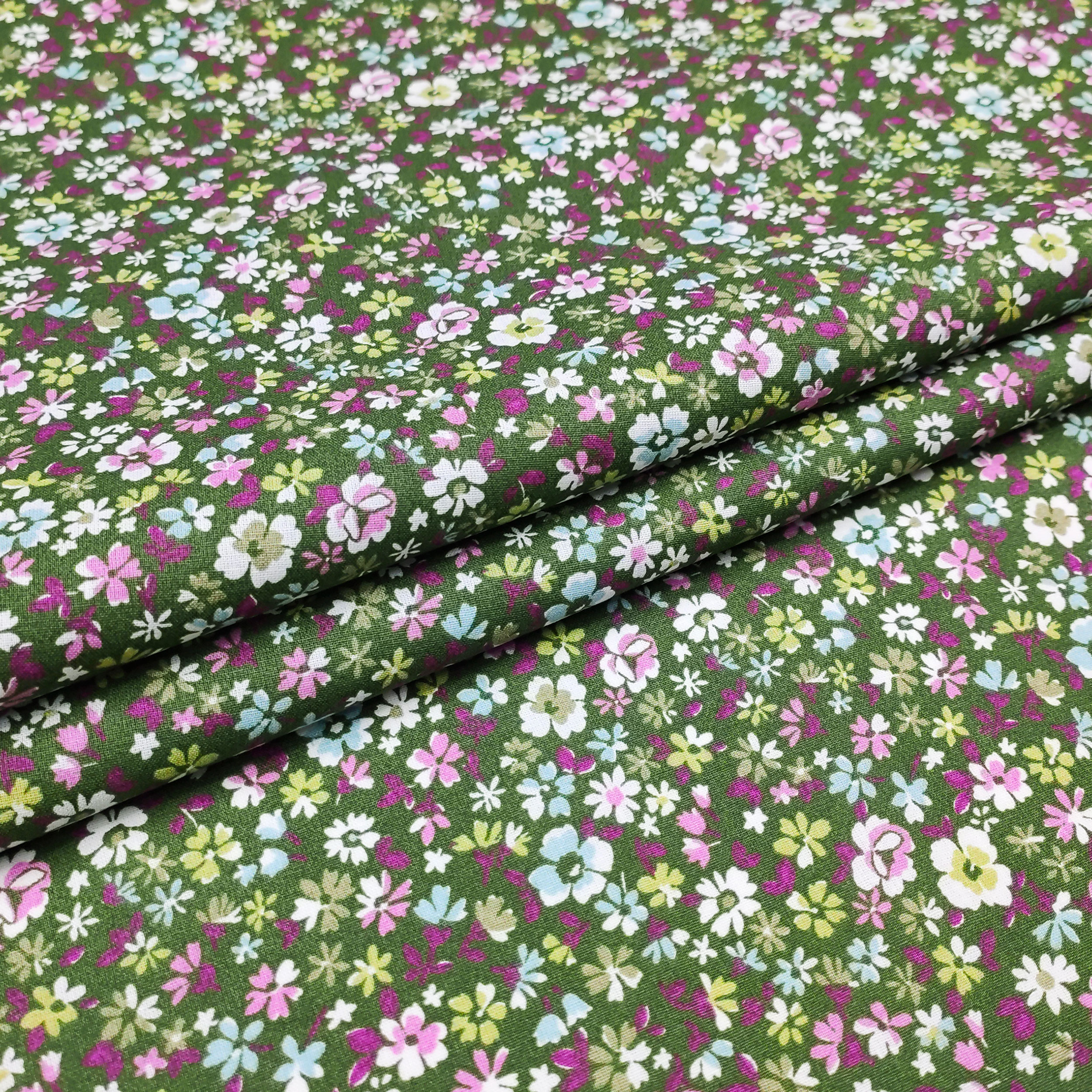 cotone fiori sfondo verde