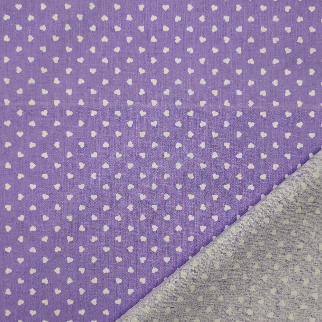 Tessuto cotone leggero percallino cuori bianchi sfondo viola