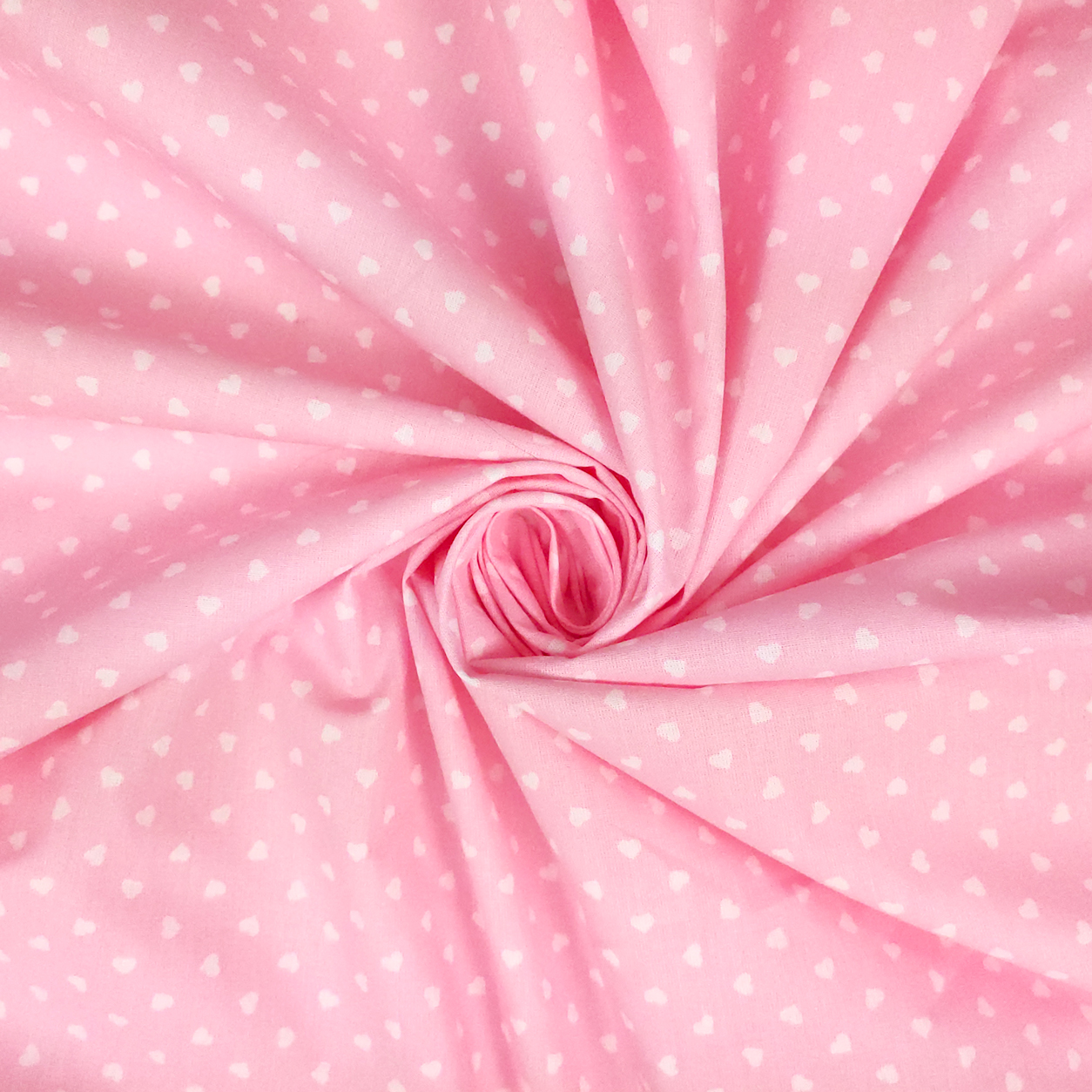 Tessuti cotone per abbigliamento percallino cuori bianchi sfondo rosa