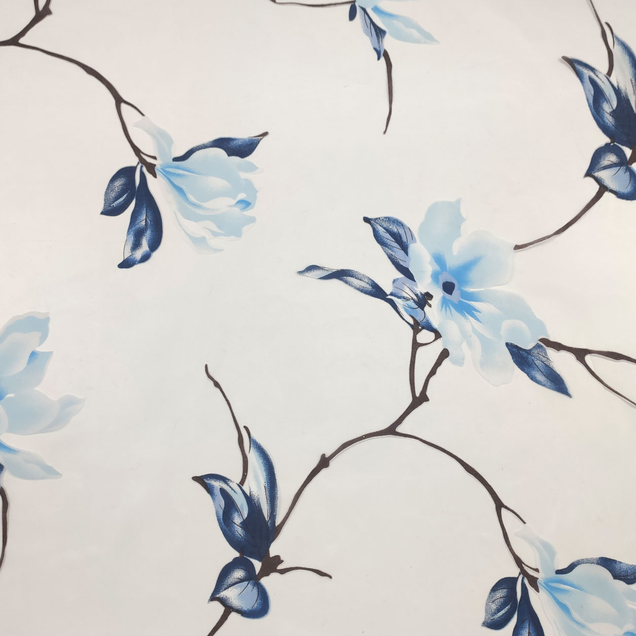 tessuto-organza-fantasia-fiori-blu