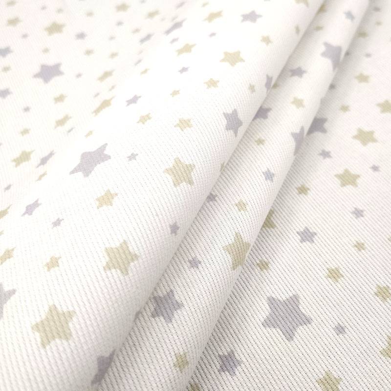 Tessuto Piquet di Cotone Fantasia Stelline Beige Image