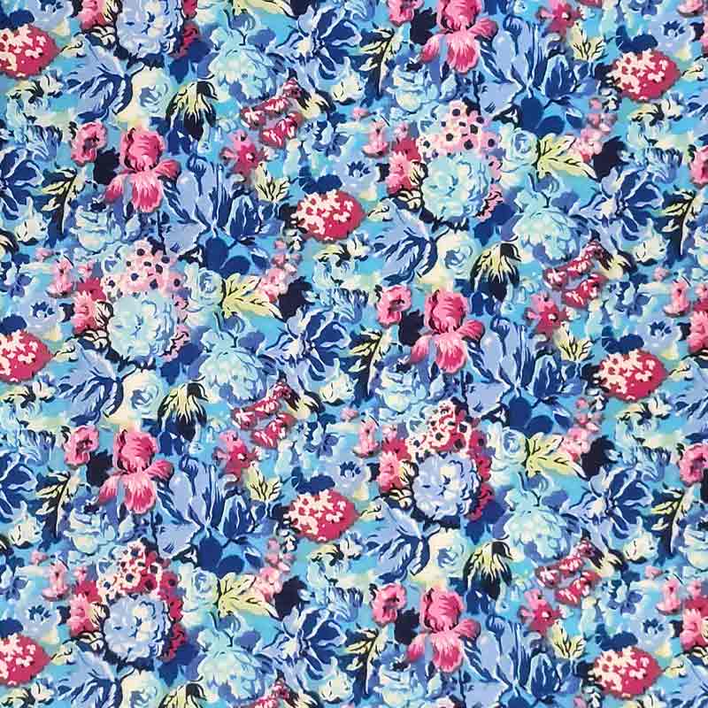 Tessuto Cotone Fiori Fuxia e Bluette Sfondo Turchese