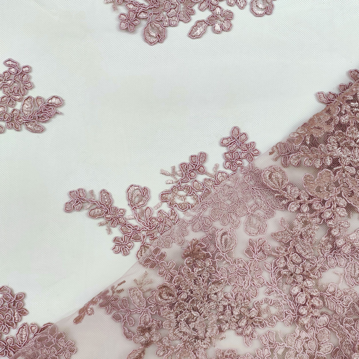 tessuto-pizzo-con-doppio-bordo-ricamato-rosa