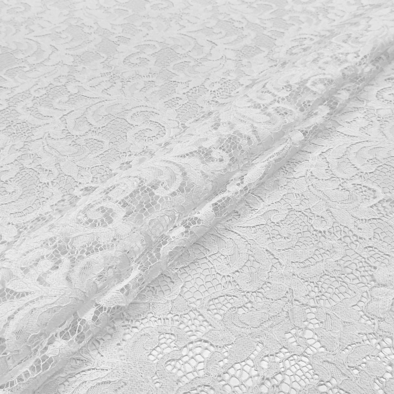tessuti-in-pizzo-bianco-ottico