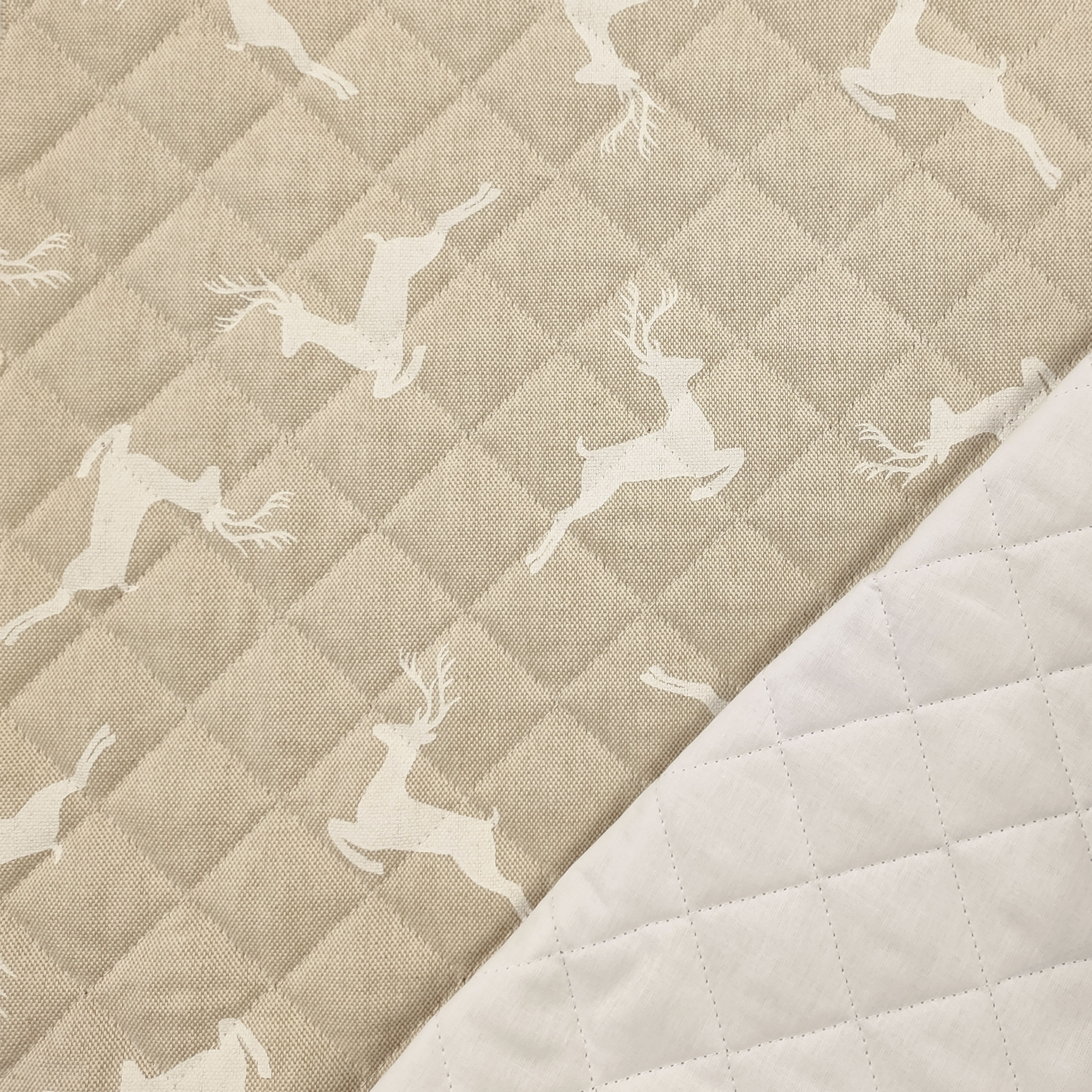 Tessuto Trapuntato Renne Sfondo Beige