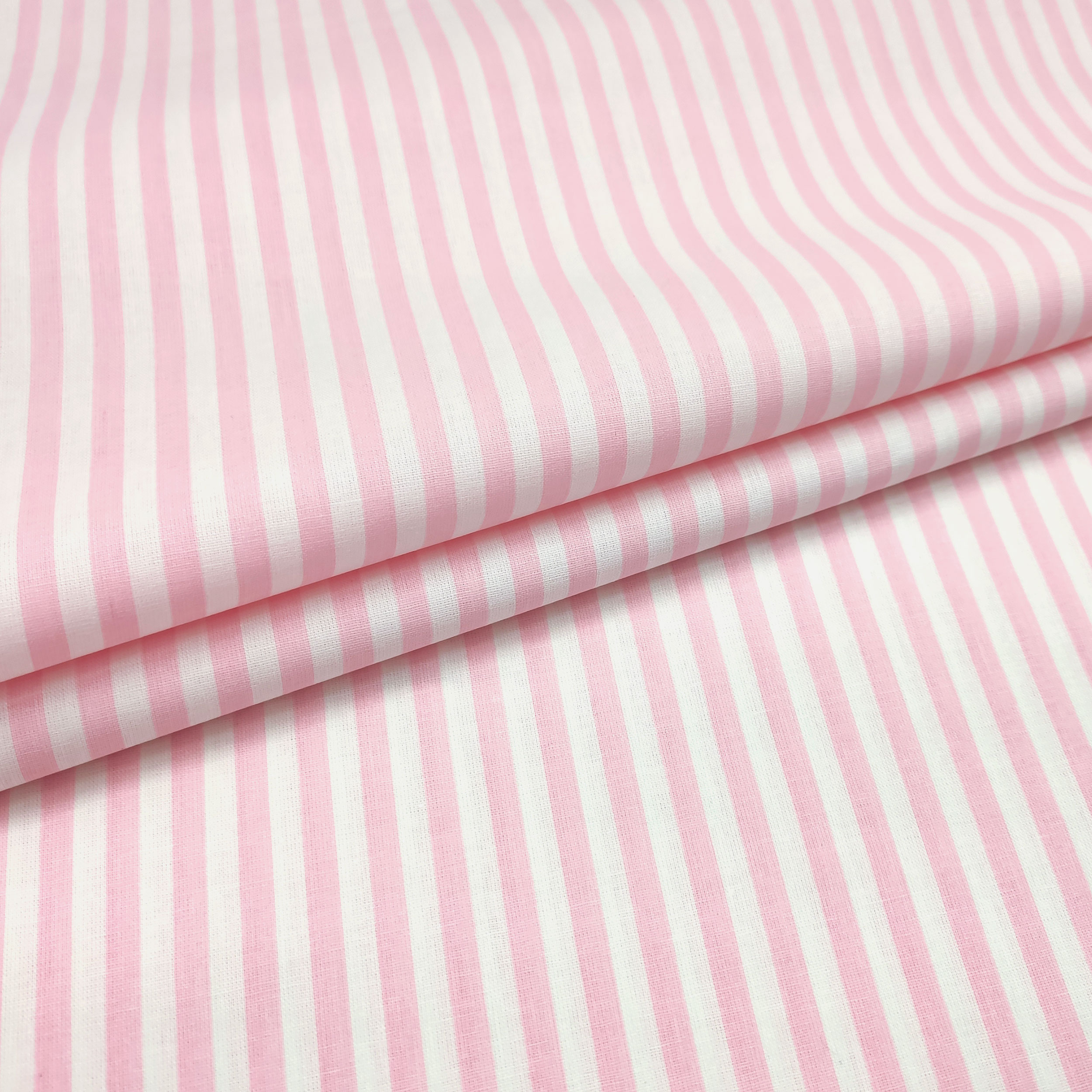 stoffa cotone con righe rosa chiaro