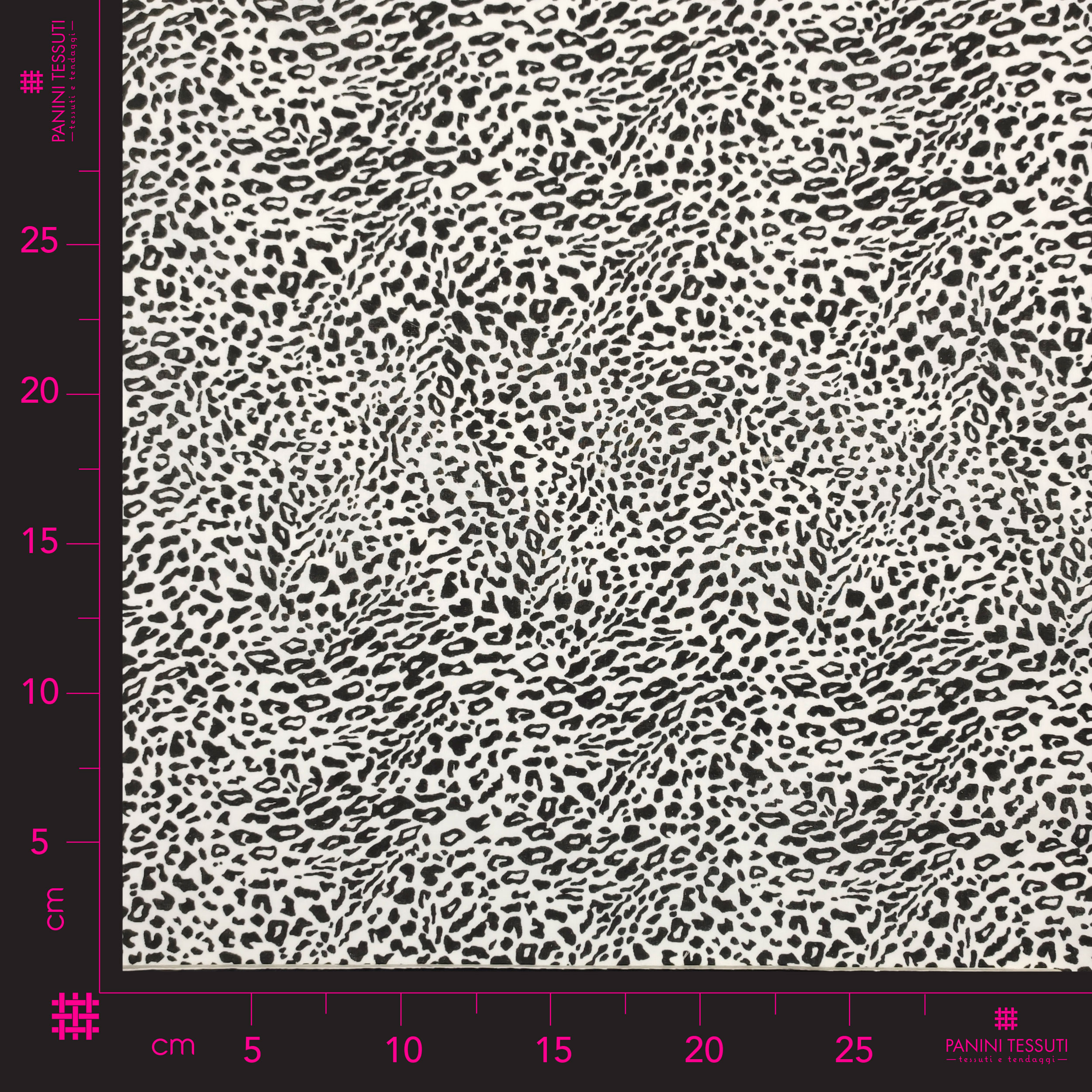 Tessuto Cotone Fantasia Leopardata Bianco e Nero