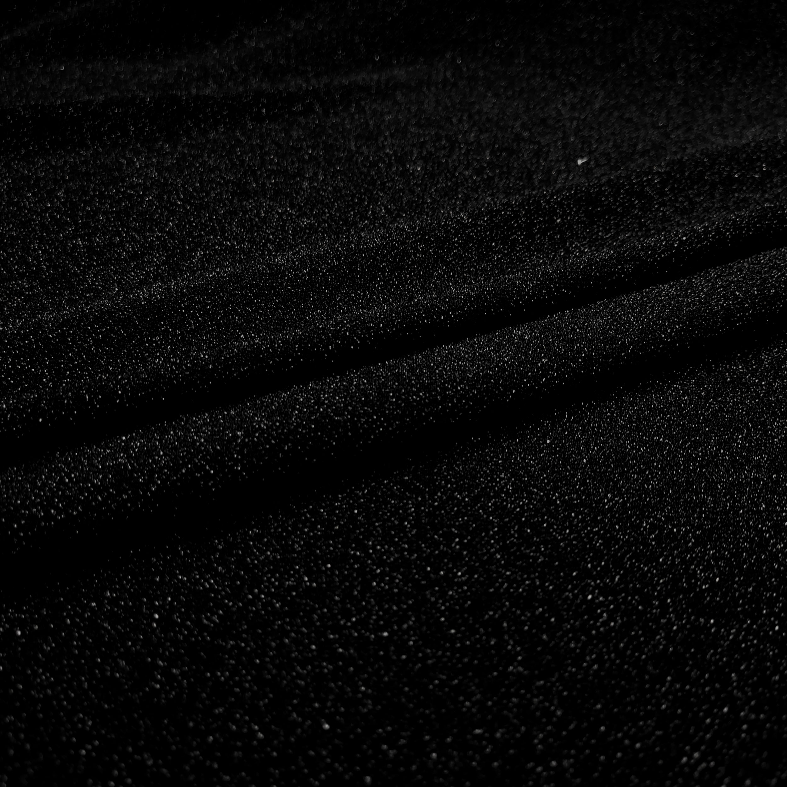 tessuto elastico glitter sfondo nero