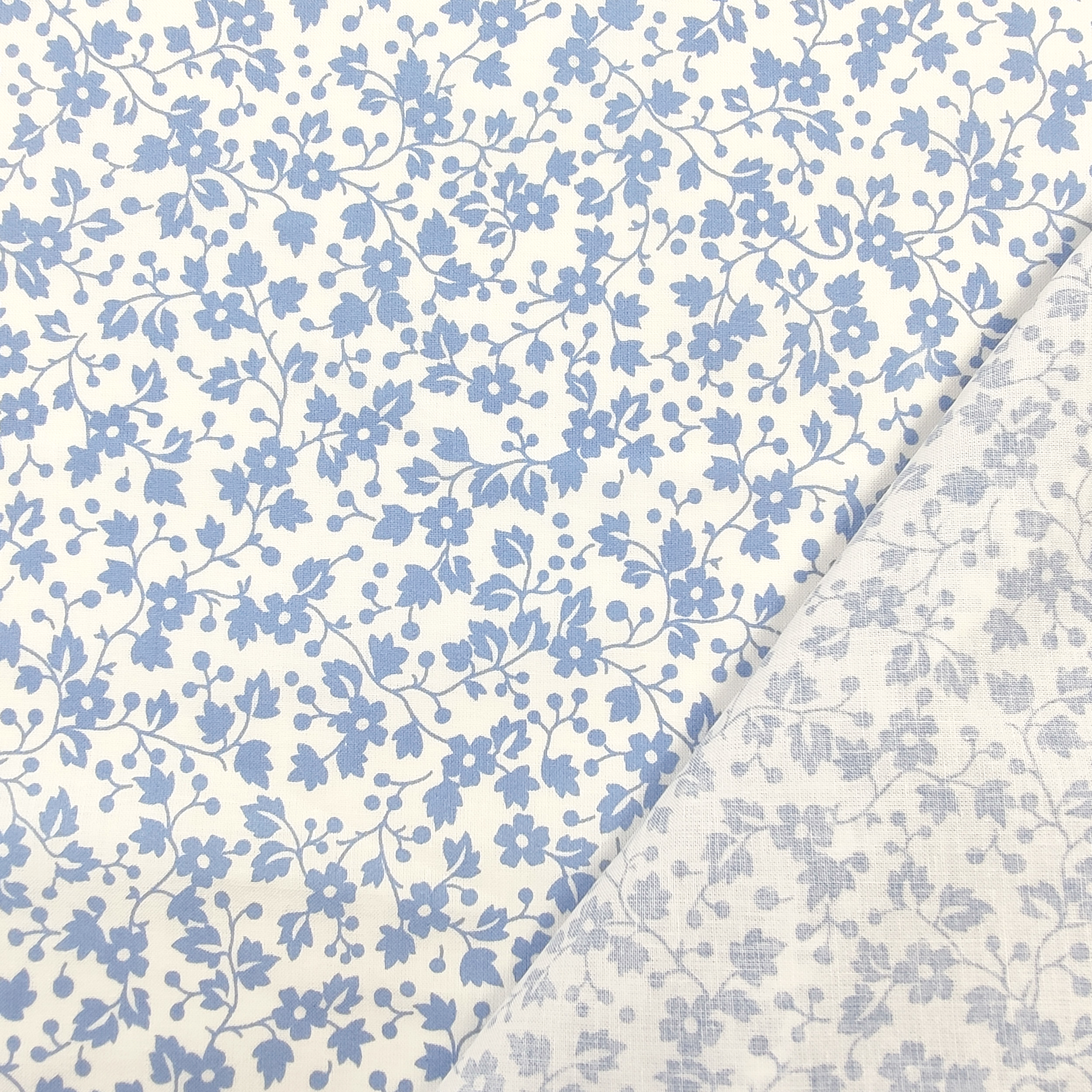 Ritaglio Tessuto Cotone Fiorellini Primaverili Azzurro 210x150 cm Image