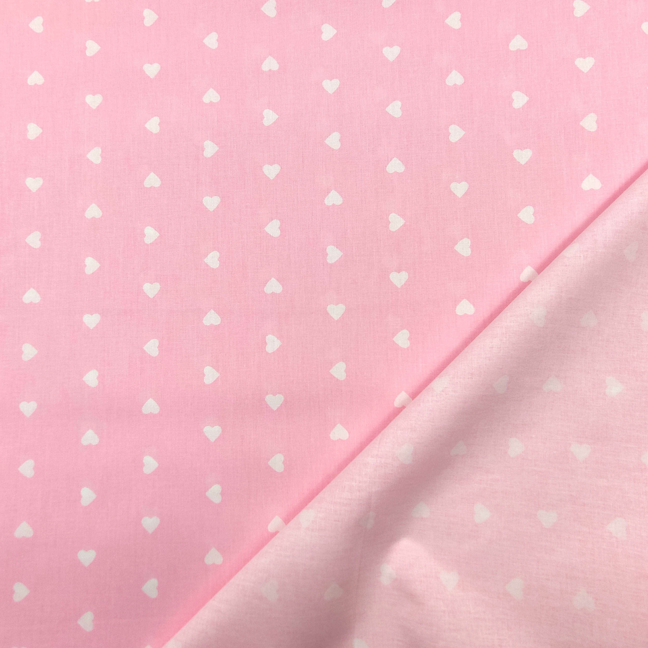 tessuto leggero cotone cuori bianchi sfondo rosa (1)