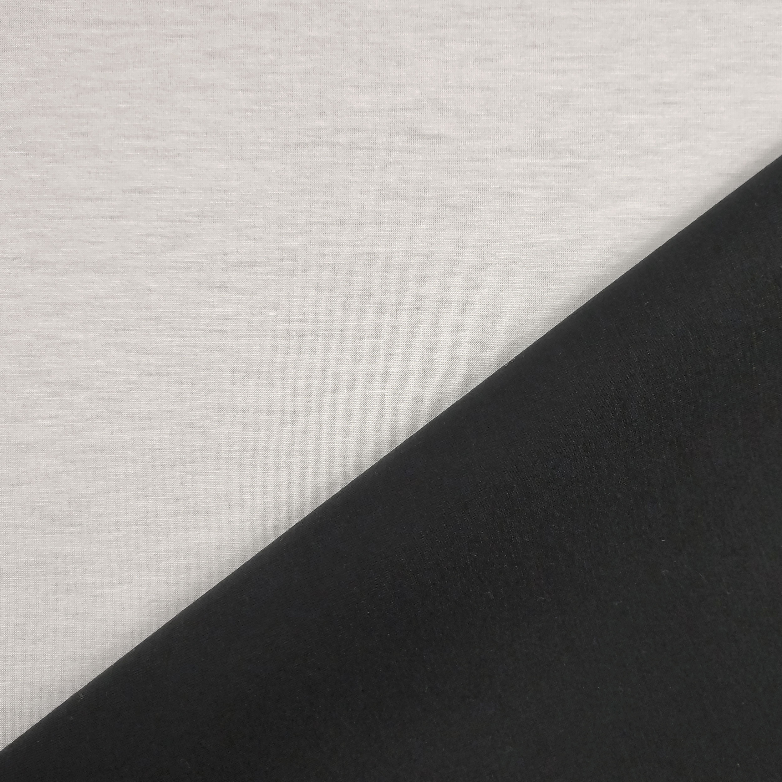 Tessuto Neoprene Bifoderato in Cotone Nero/Bianco