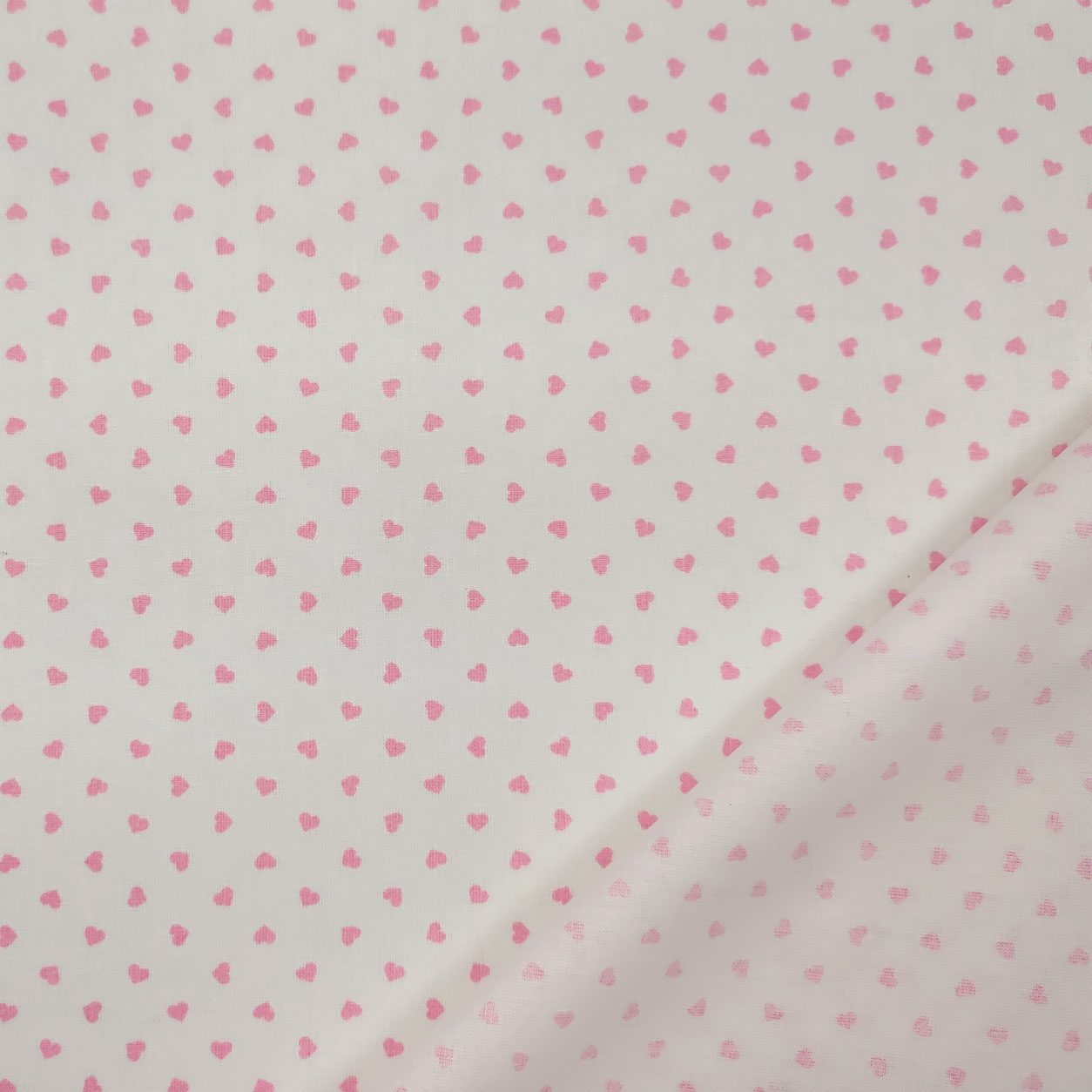 cotone tessuto leggero percallino sfondo bianco cuori rosa