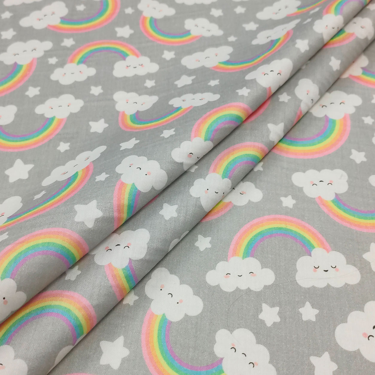 tessuto-in-cotone-arcobaleni-sfondo-grigio