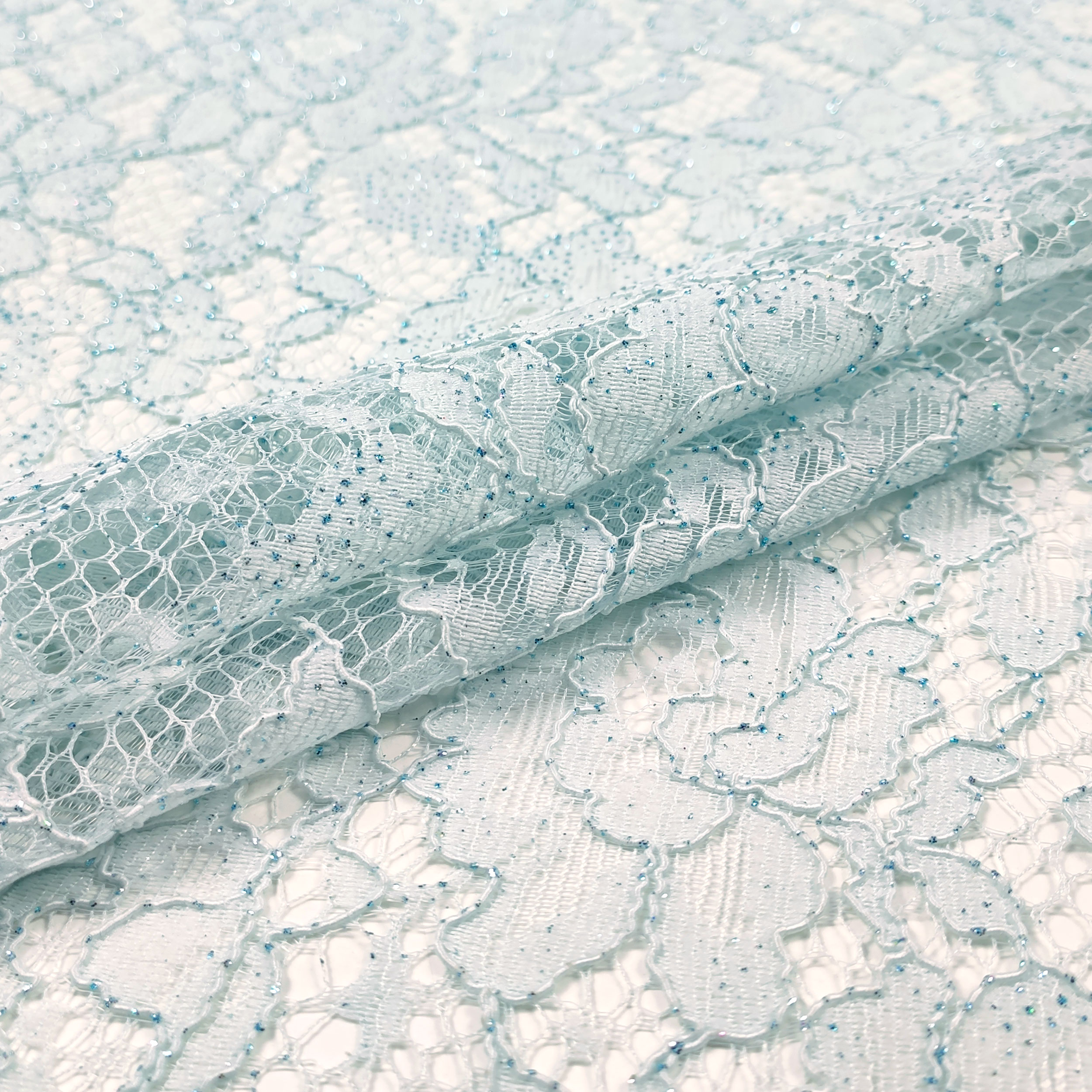 Tessuto in Pizzo Lurex per Abbigliamento Azzurro