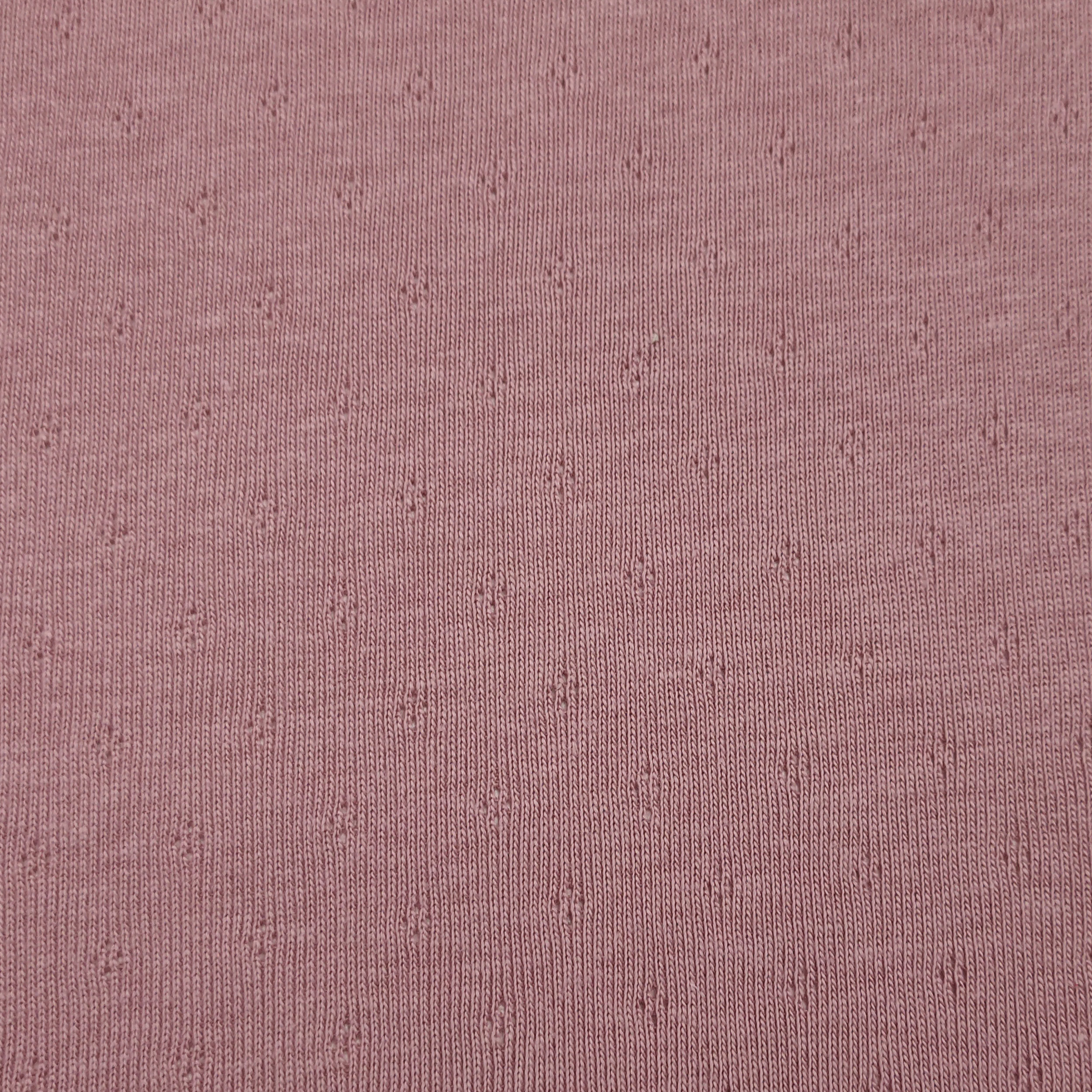 Jersey Cotone Fiori Traforati su Sfondo Rosa