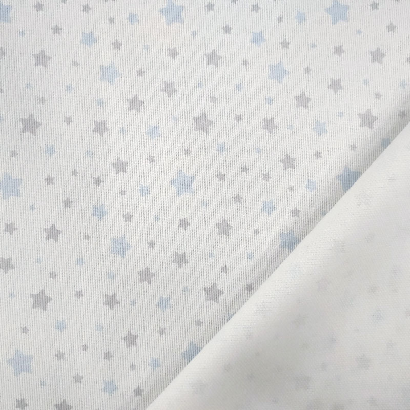 Tessuto piquet di cotone stelline azzurre