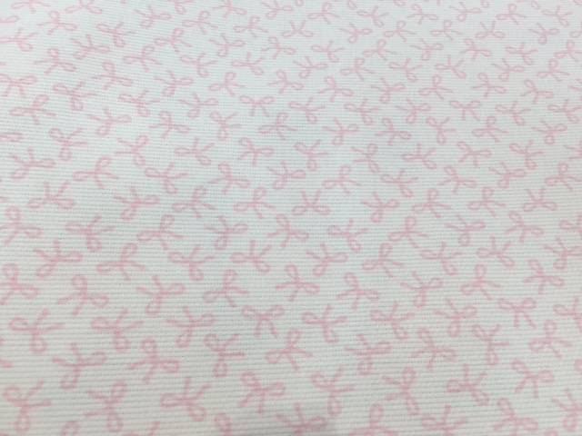 Tessuto happy piquet fiocchi rosa 1