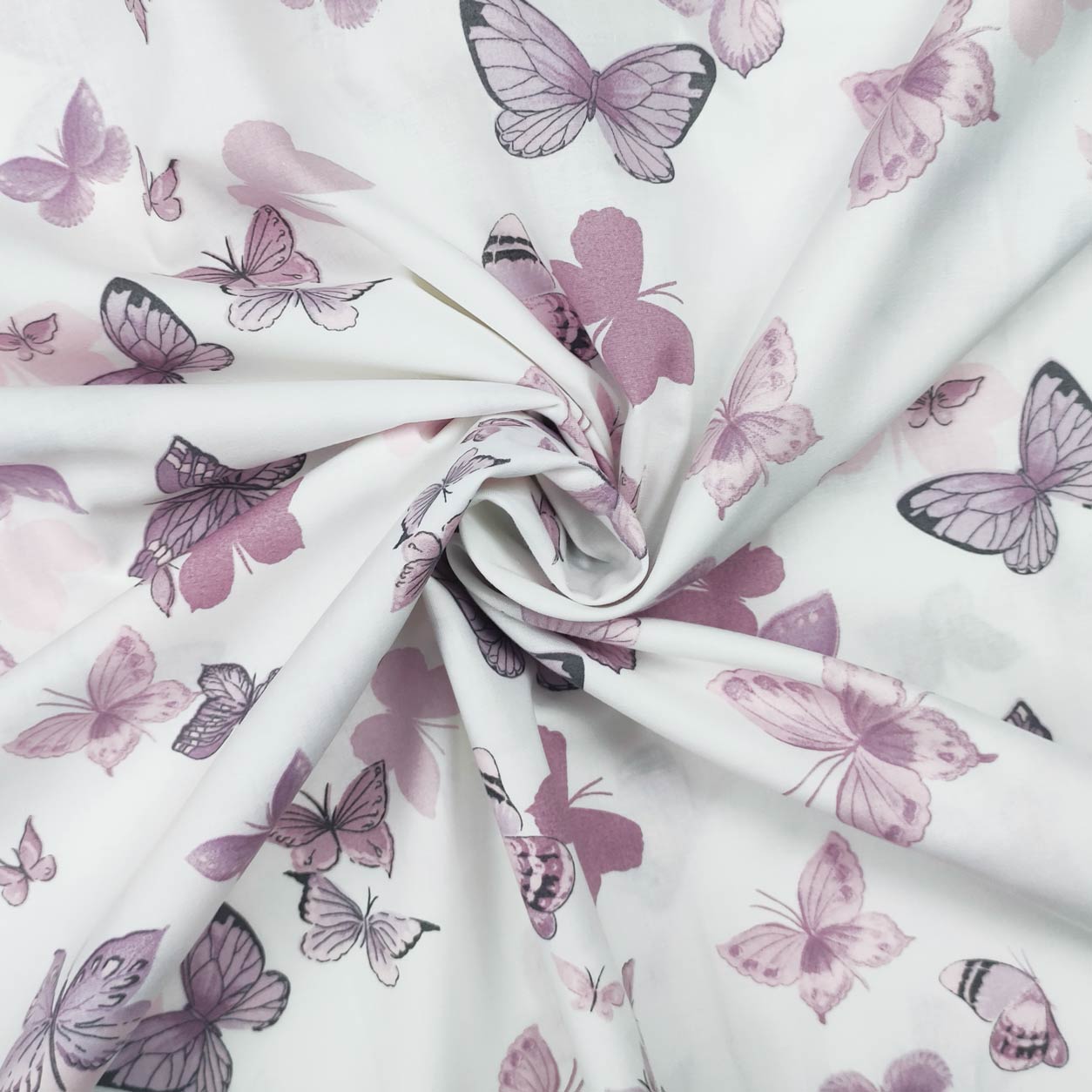 tessuto-in-cotone-da-lenzuolo-farfalle-lilla-rosa