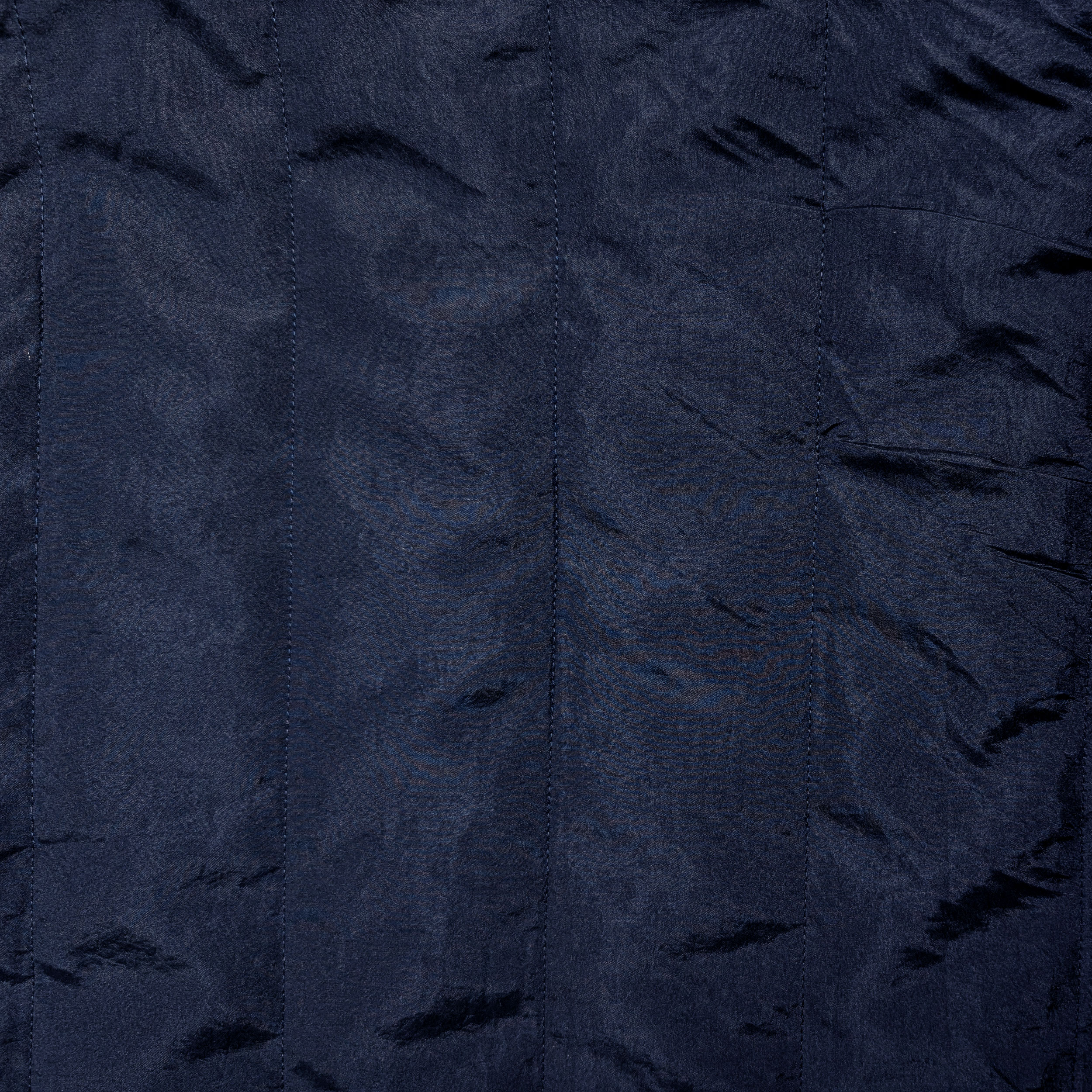 Trapuntato Blu Scuro con Retro in TNT Nero Image