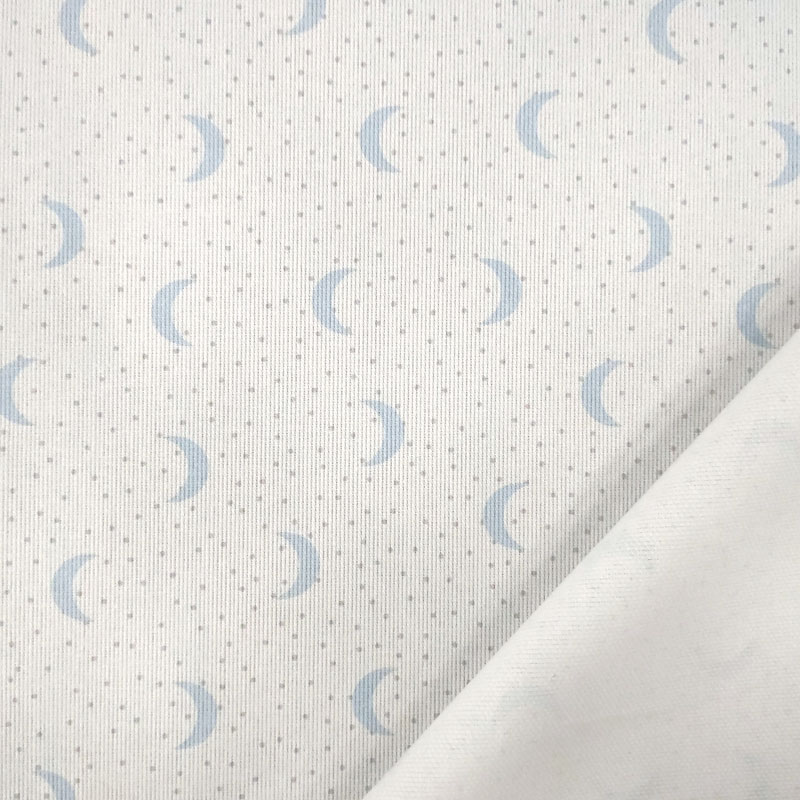 Tessuto Piquet di Cotone Fantasia Lune Sfondo Bianco