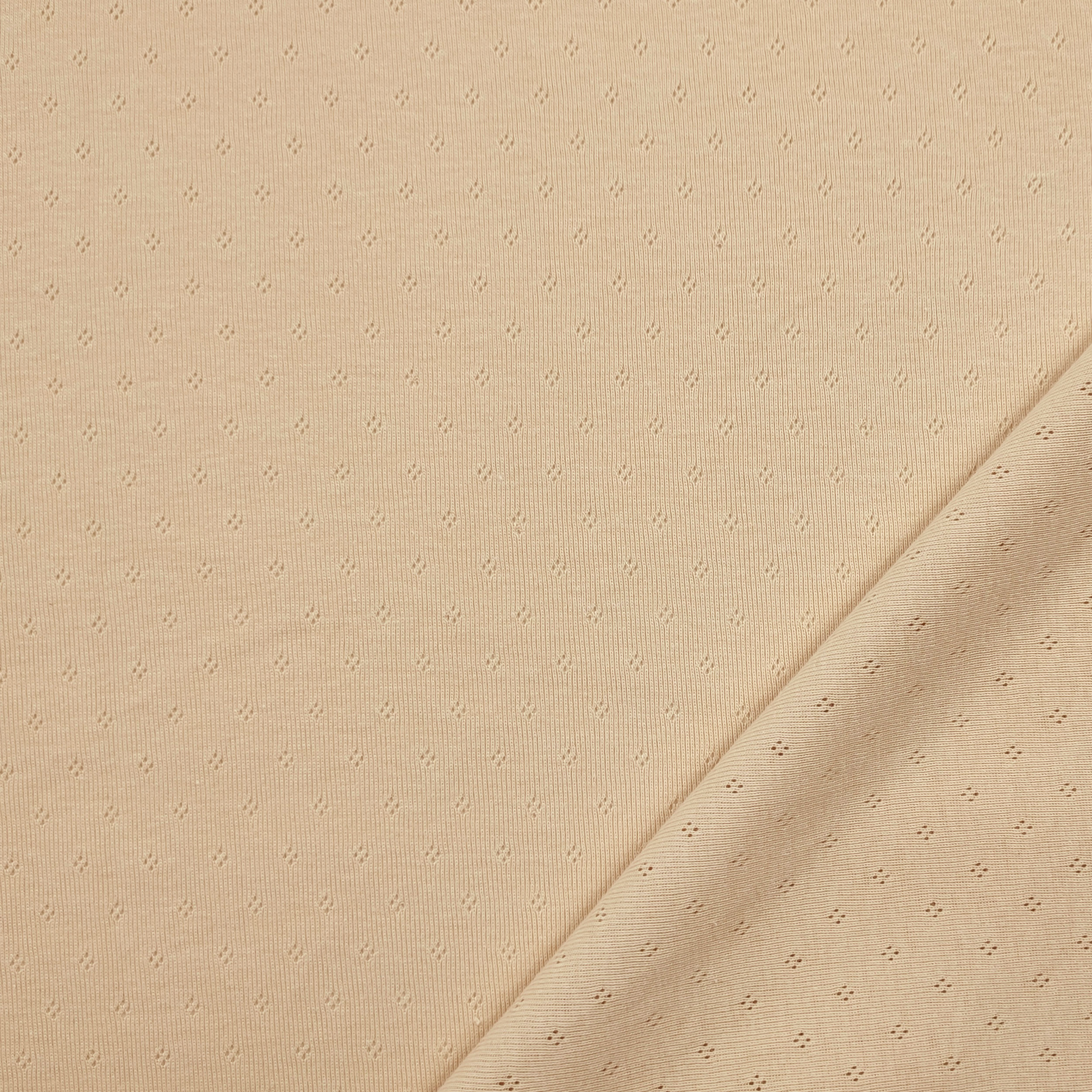 Jersey Cotone Fiori Traforati su Sfondo Beige Chiaro