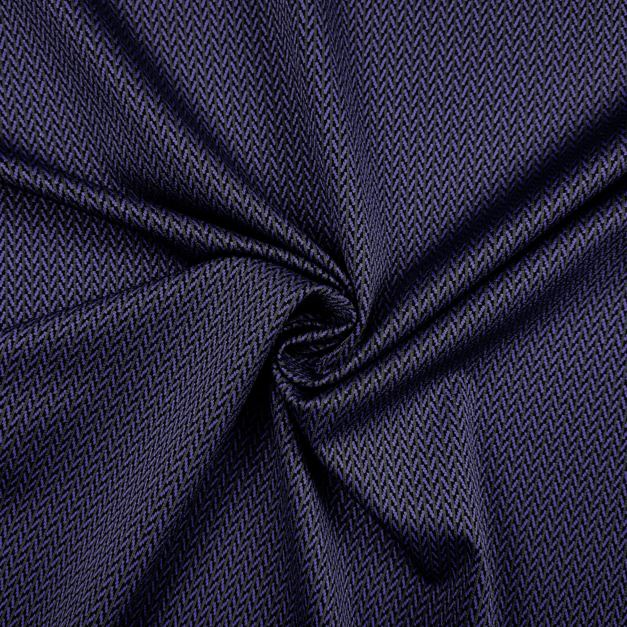 Tessuto geometrico di maglina punto milano viola e verdone