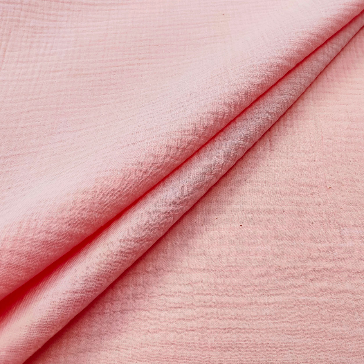 tessuto-mussola-in-cotone-rosa-baby