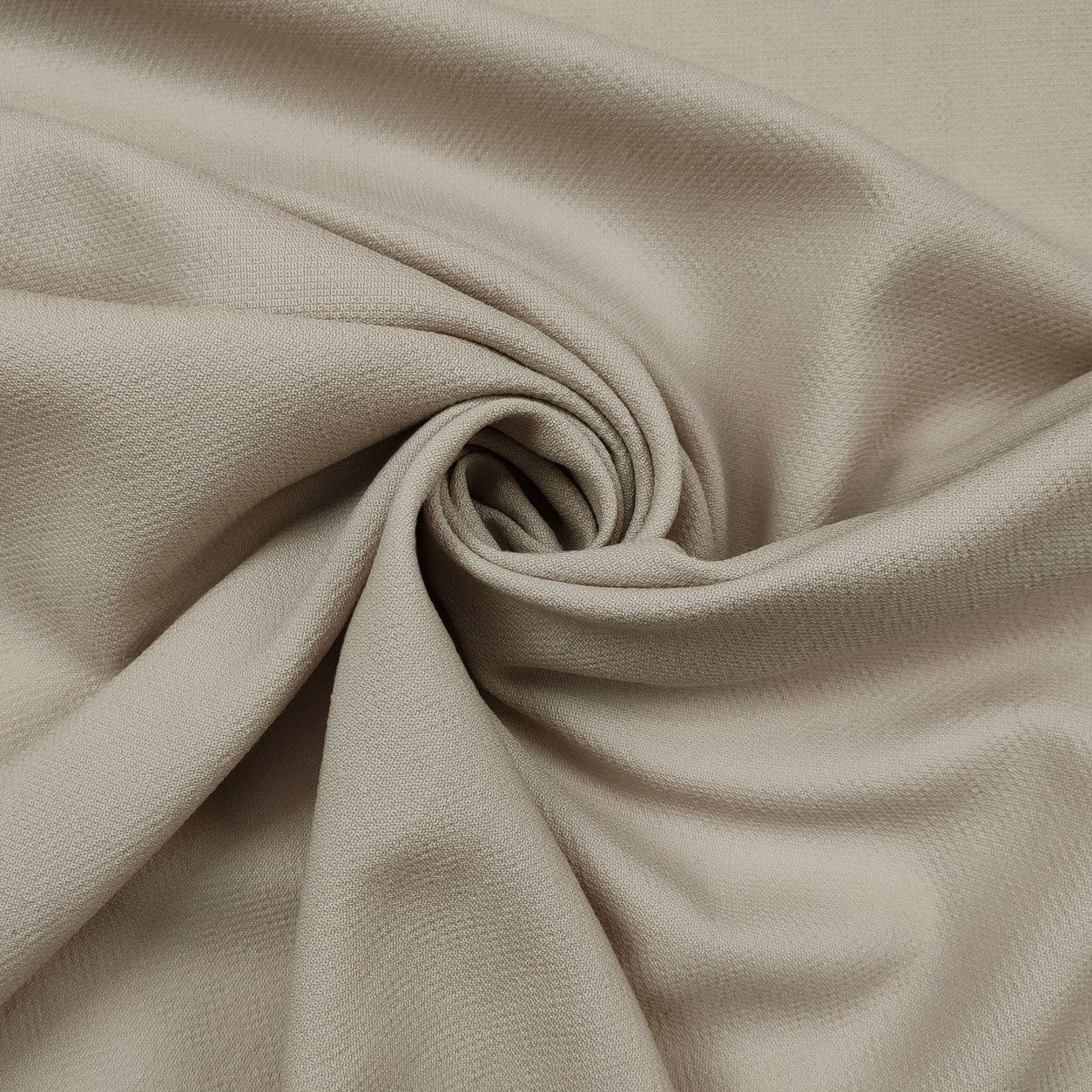 cotone-tessuto-abbigliamento-sabbia
