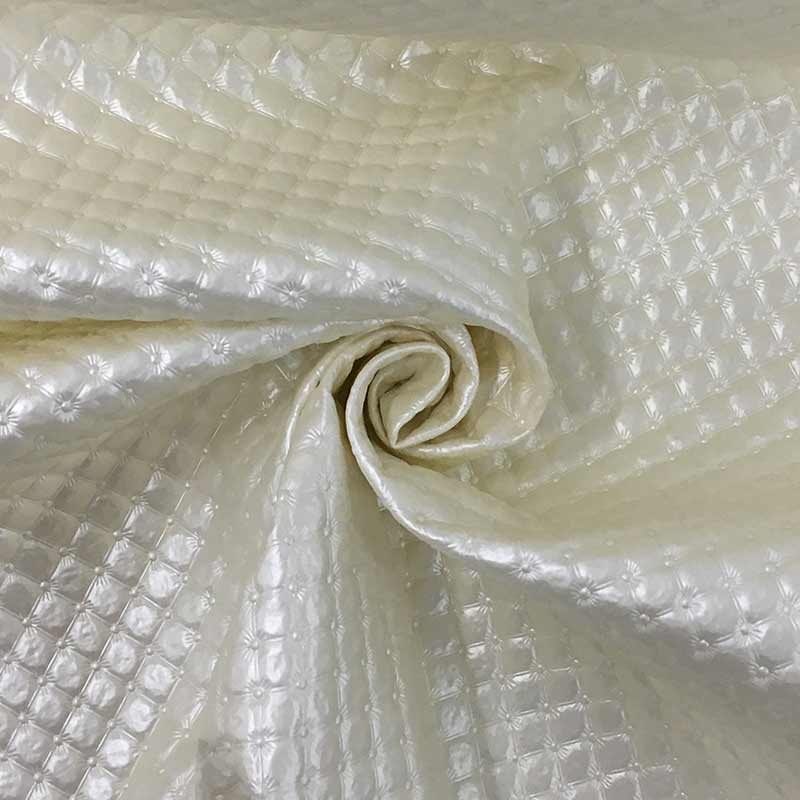 Tessuto-Ecopelle-Effetto-Matelassè