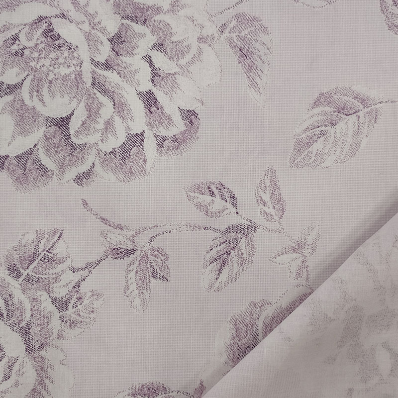 Tessuto cotone leggero rose disegnate lilla