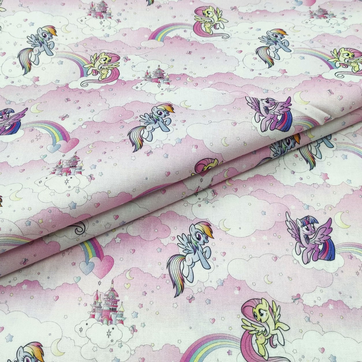 tessuto-in-cotone-my-little-pony-arcobaleni-e-nuvole-rosa