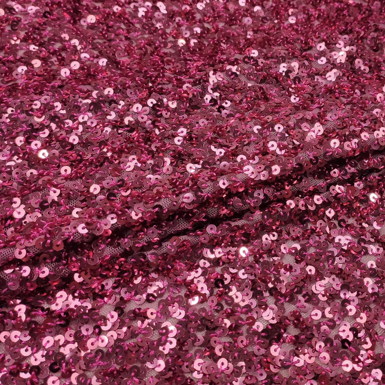 Tessuto Paillettes su Tulle Fuxia