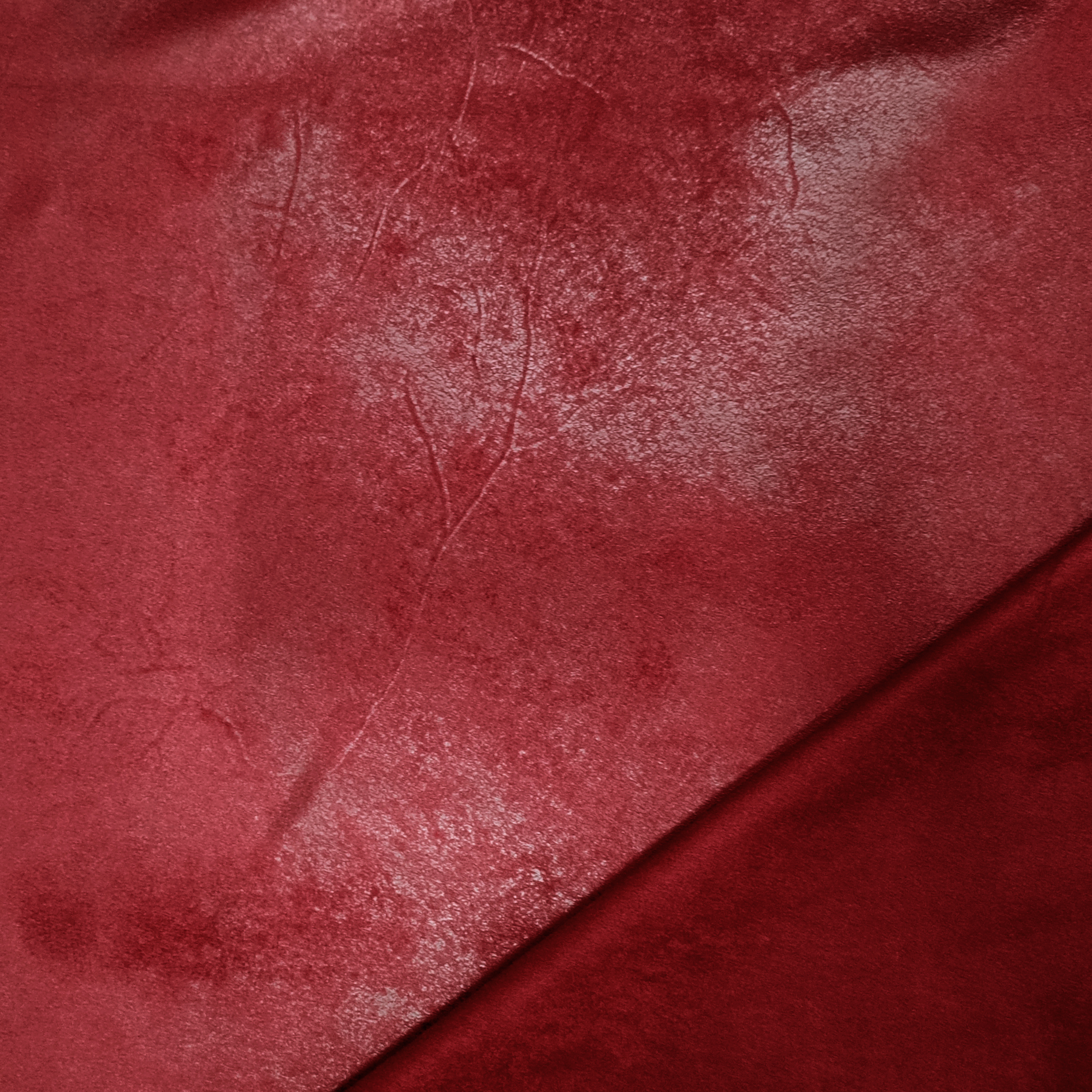 Indumenti in tessuto spalmato rosso