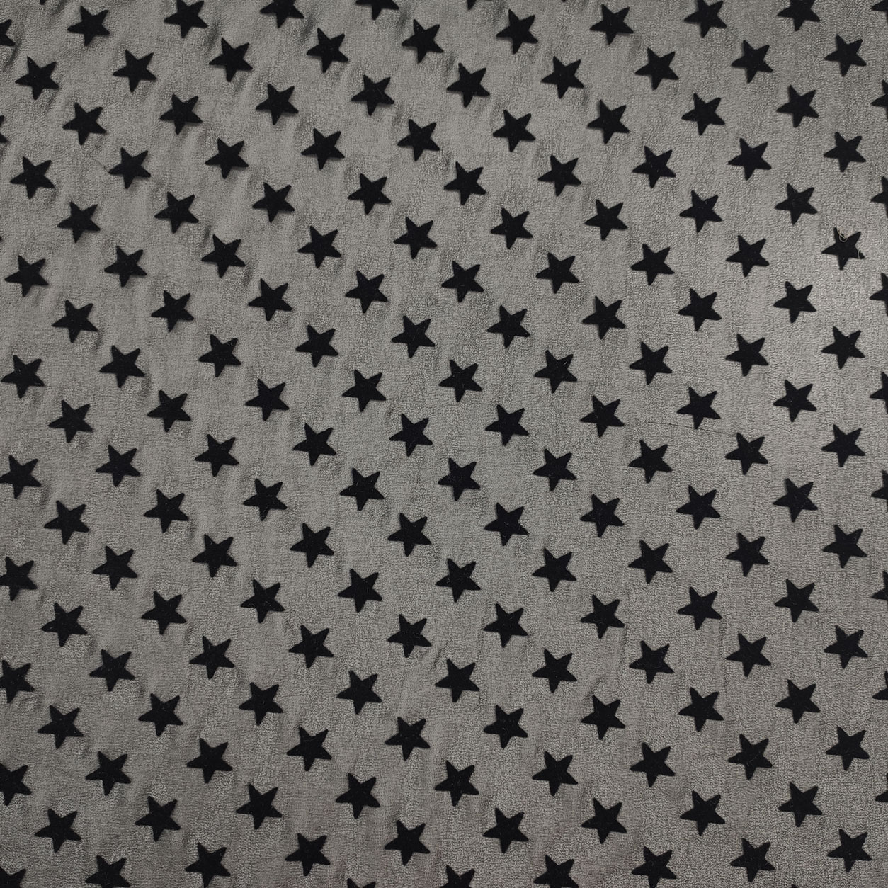 Tessuto Voile Nero con Stelle Floccate