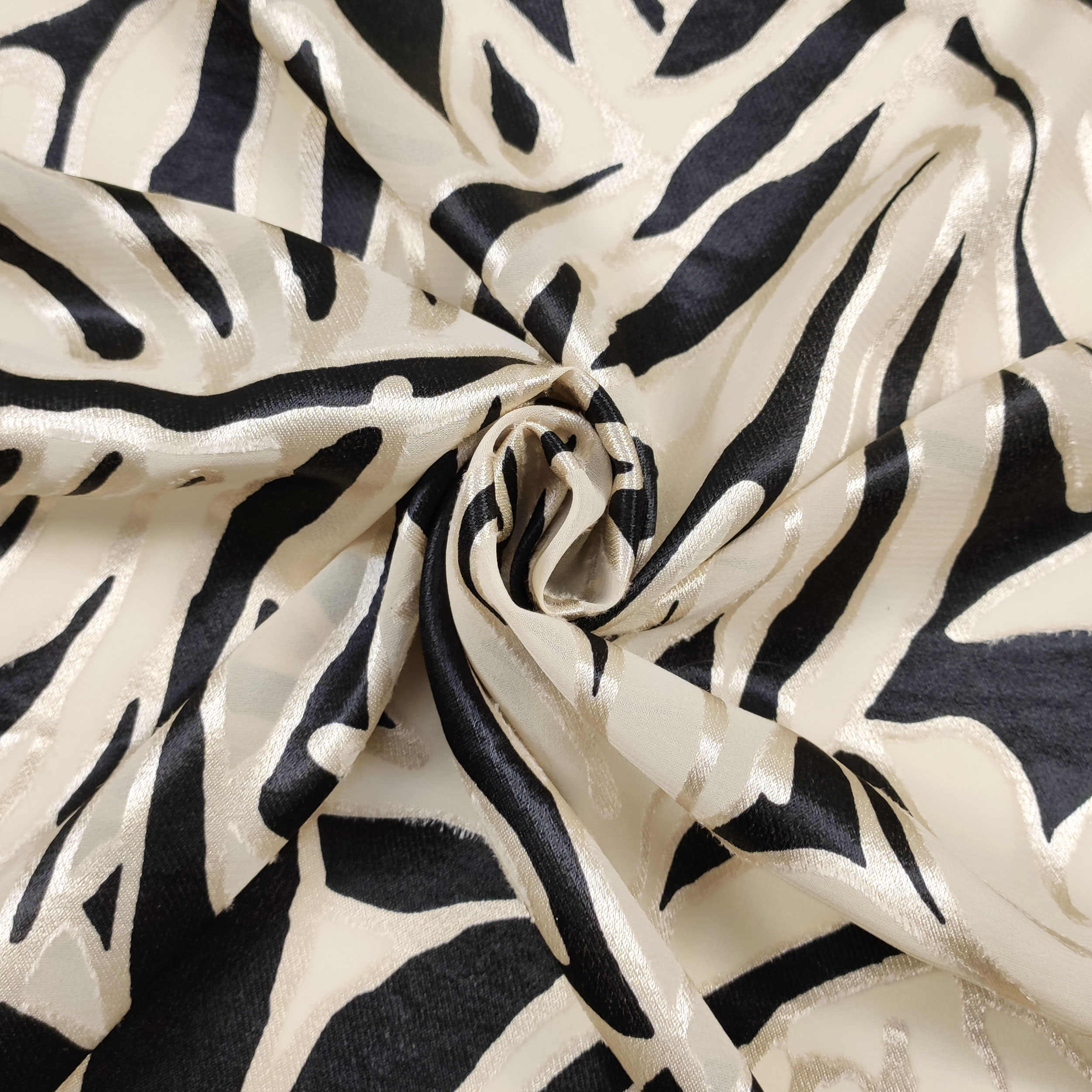 Tessuto Devorè Foglie Beige e Nero