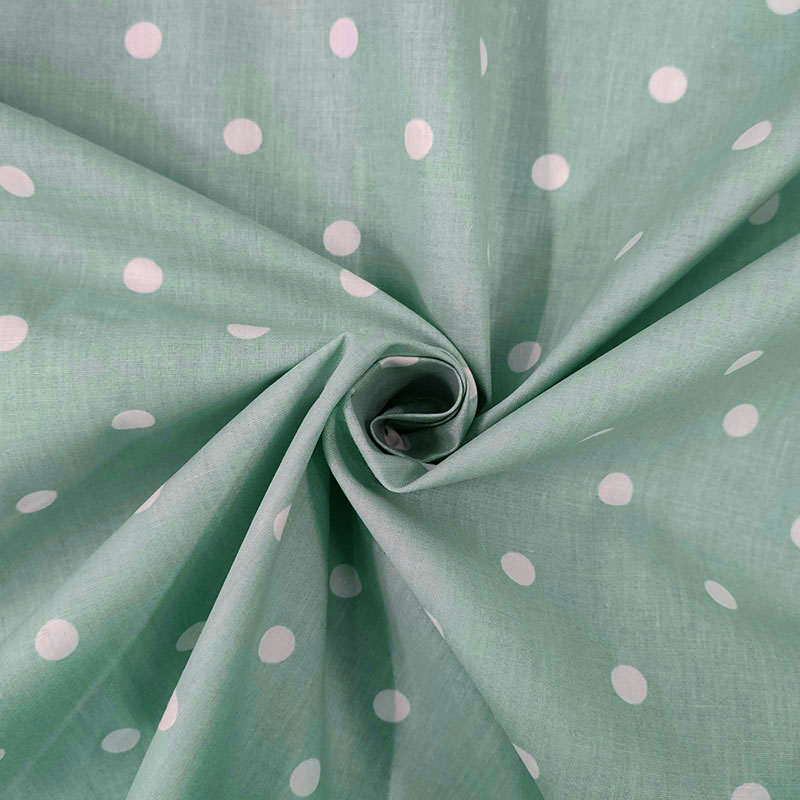 Tessuto di cotone per fodere verde pois bianchi
