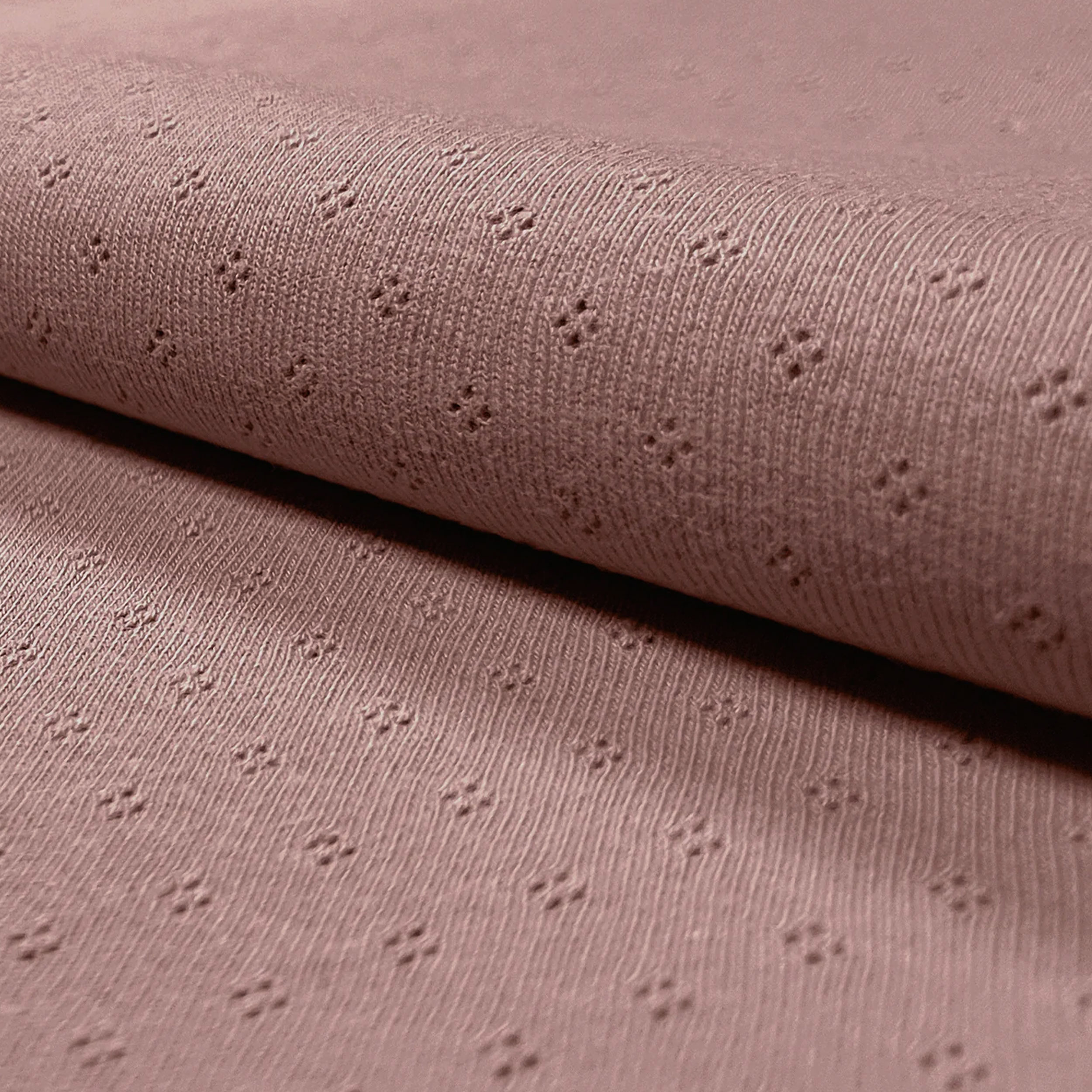 Jersey Cotone Fiori Traforati su Sfondo Rosa
