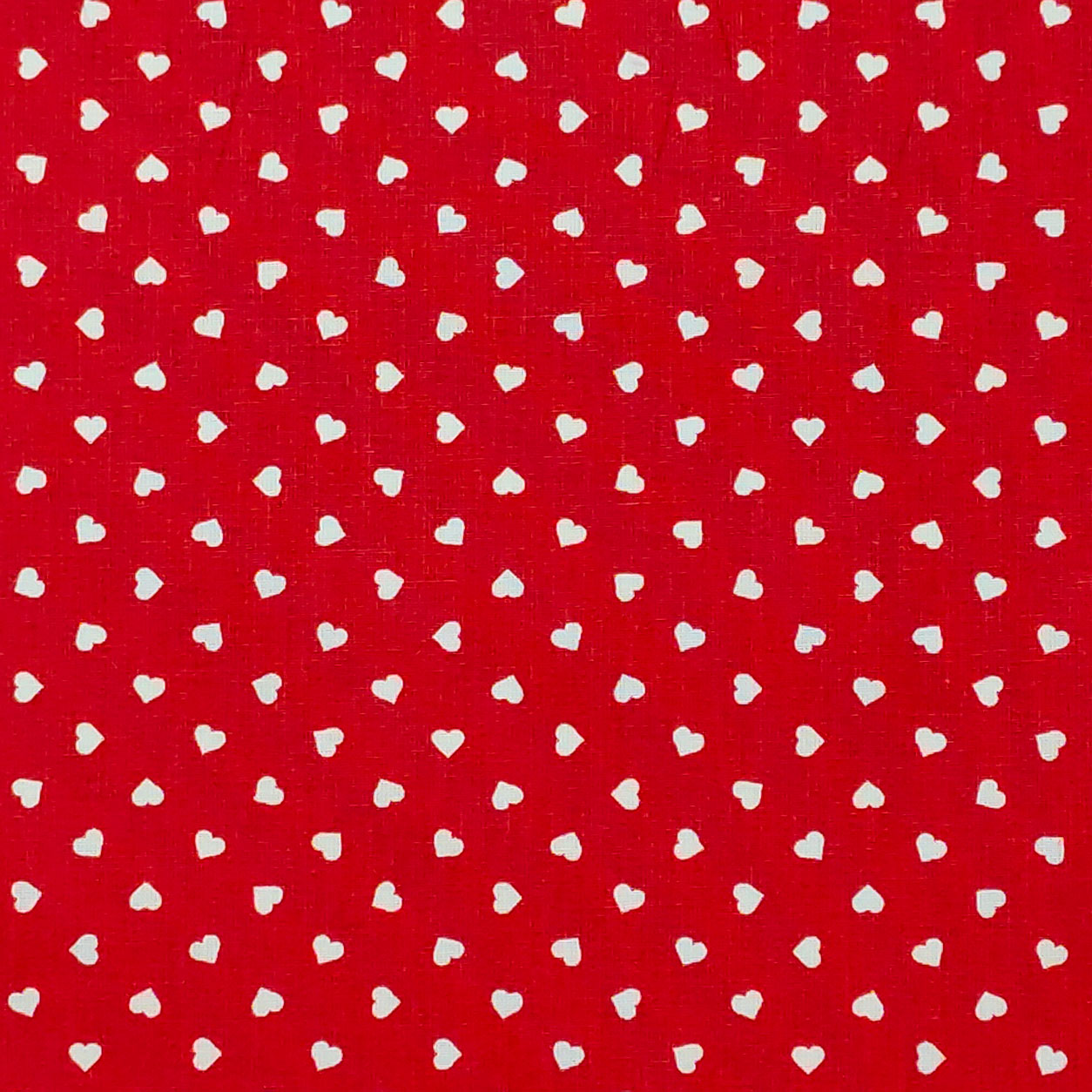 Tessuto cotone percallino cuori bianchi sfondo rosso