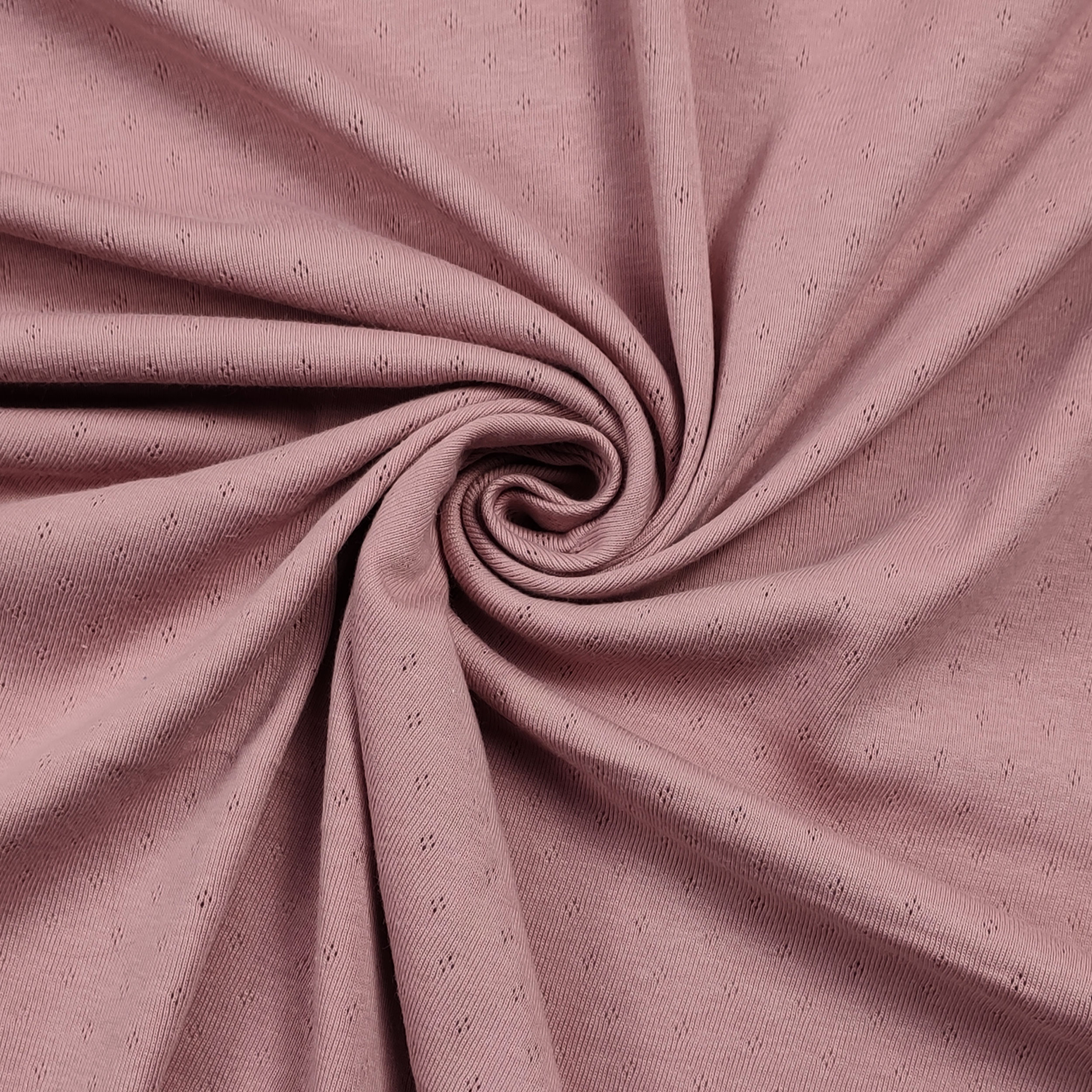Jersey Cotone Fiori Traforati su Sfondo Rosa