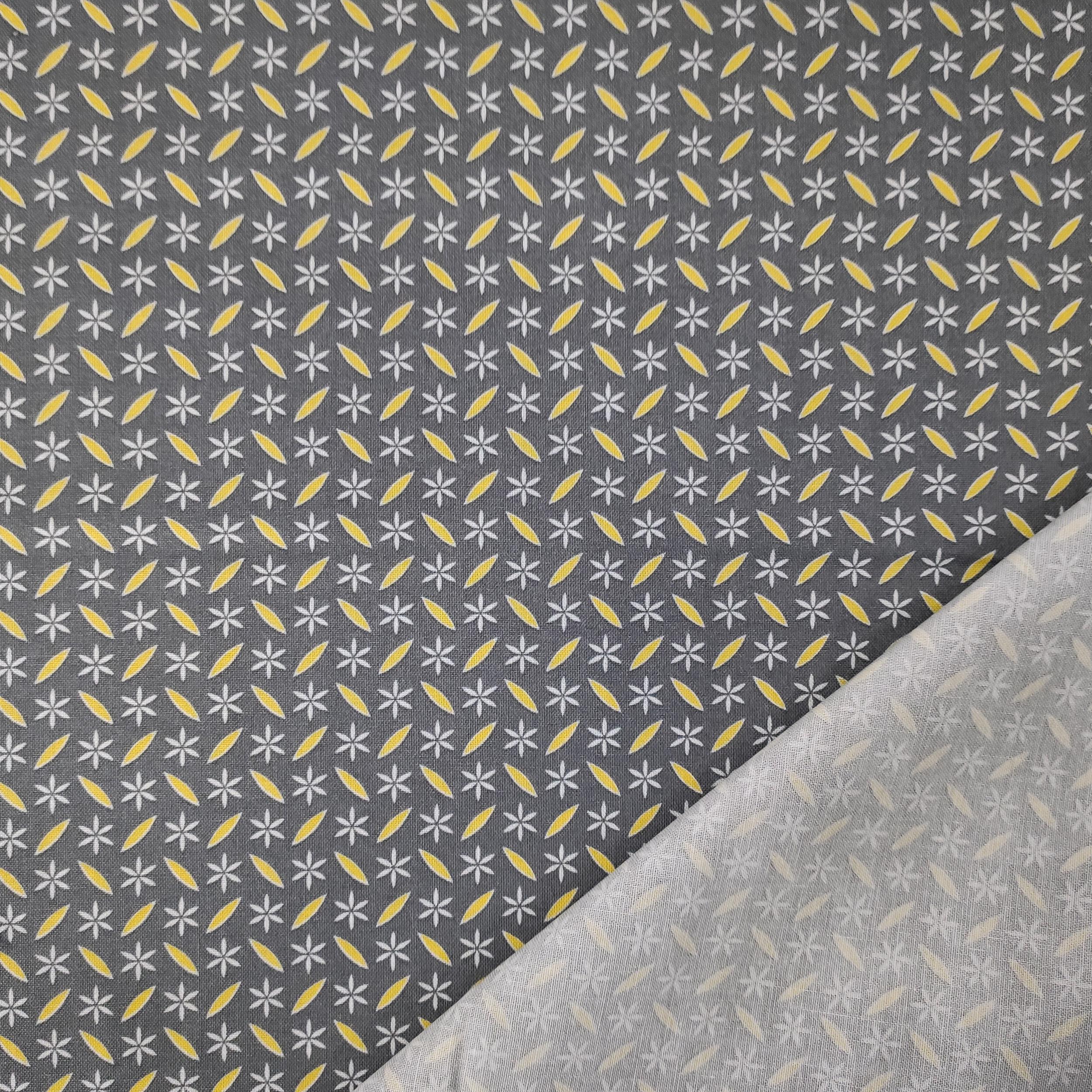 tessuto-cotone-leggero-fiorellini-primaverili-grigio