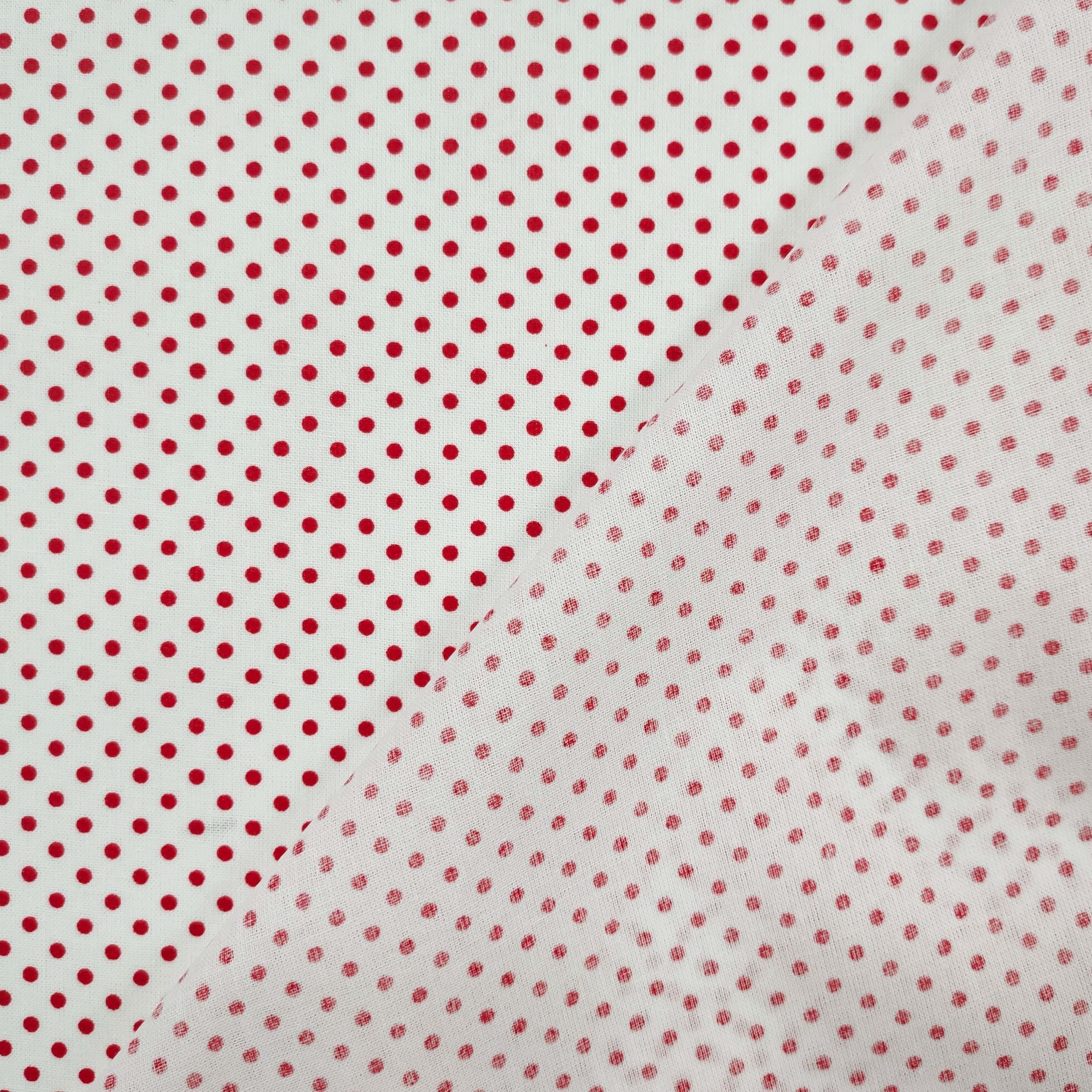 tessuto cotone pois rossi sfondo bianco