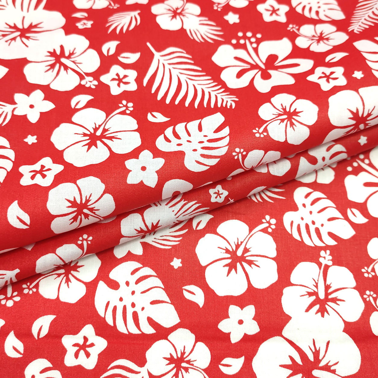 Tessuto di cotone fiori tropicali sfondo rosso