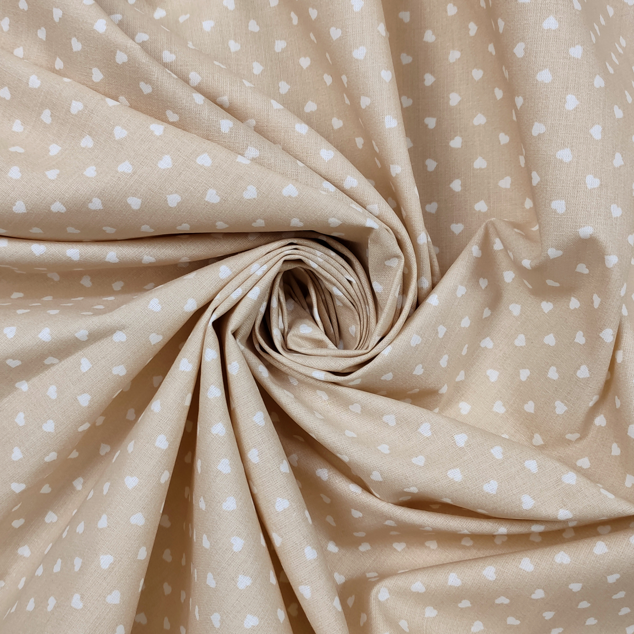 Tessuti cotone percallino cuori bianchi sfondo beige
