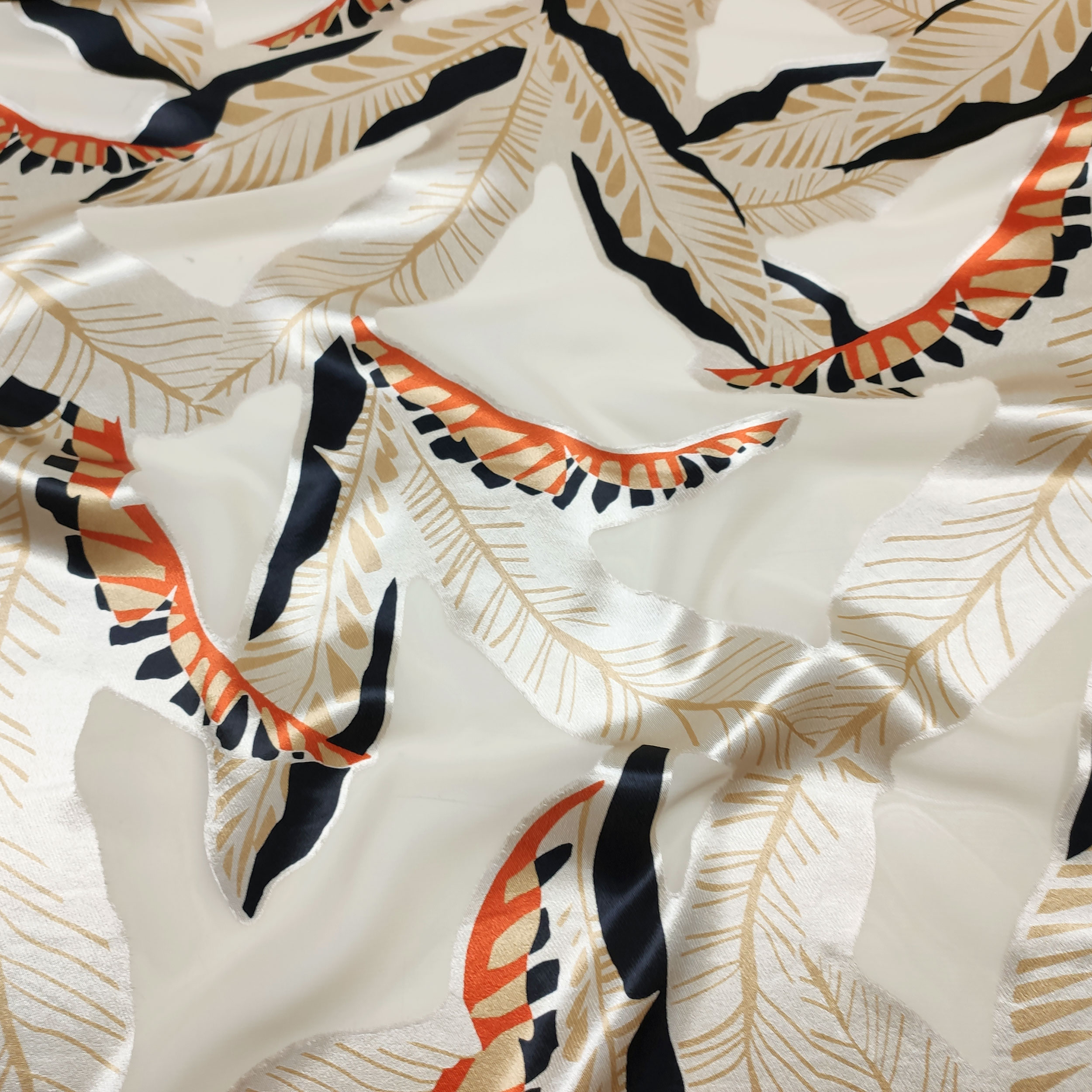 Devorè Alta Moda Foglie Beige Arancio Nero | Panini