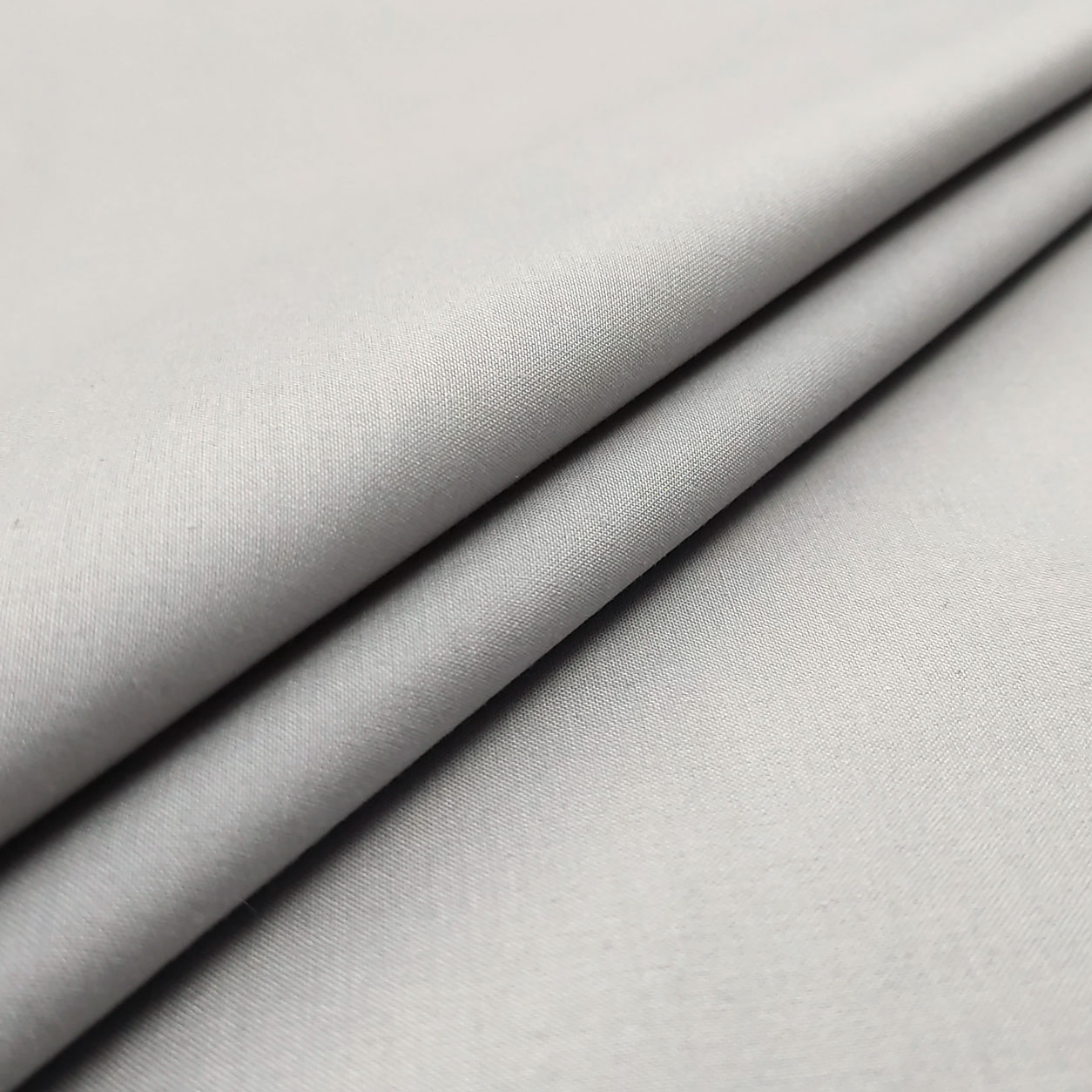 misto-cotone-tessuto-abbigliamento-grigio