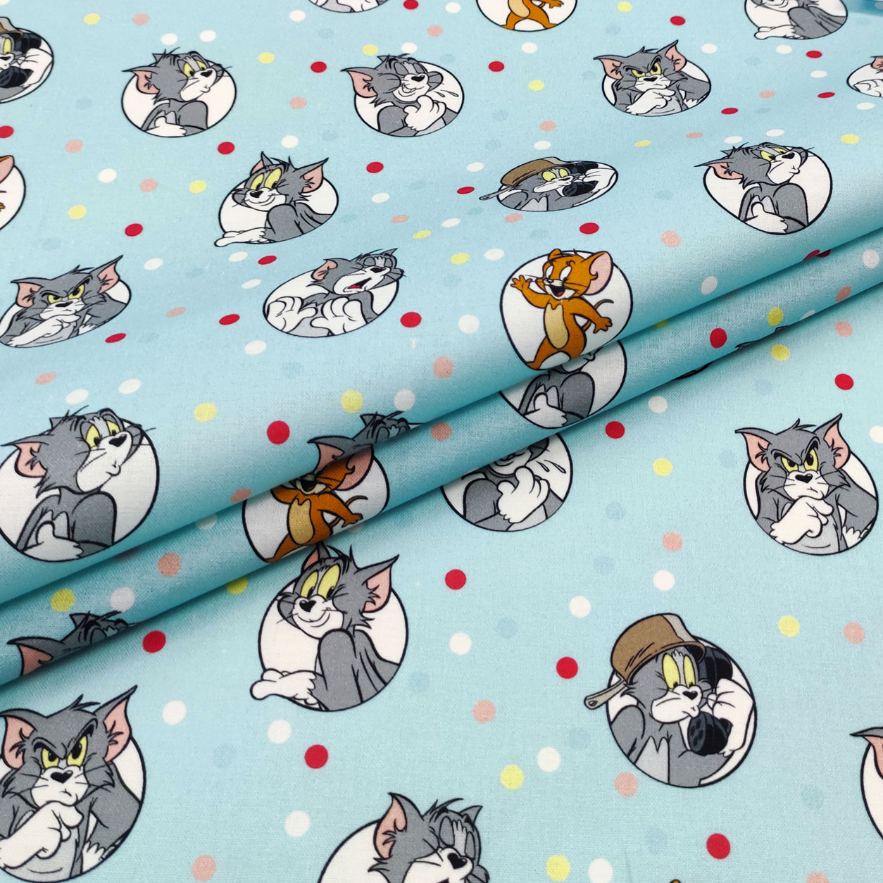 stoffa-cotone-tom-e-jerry-pois-colorati